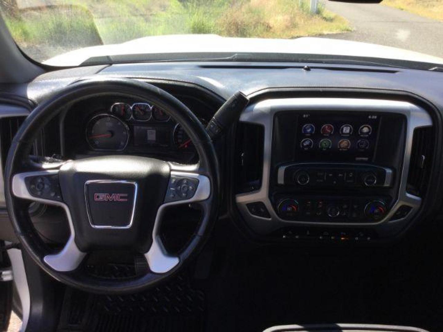 2015 Quicksilver Metallic /Jet Black, leather GMC Sierra 1500 SLT Crew Cab Long Box 4WD (3GTU2VECXFG) with an 5.3L V8 OHV 16V engine, 6-Speed Automatic transmission, located at 1801 Main Street, Lewiston, 83501, (208) 743-9371, 46.417065, -117.004799 - Photo#14