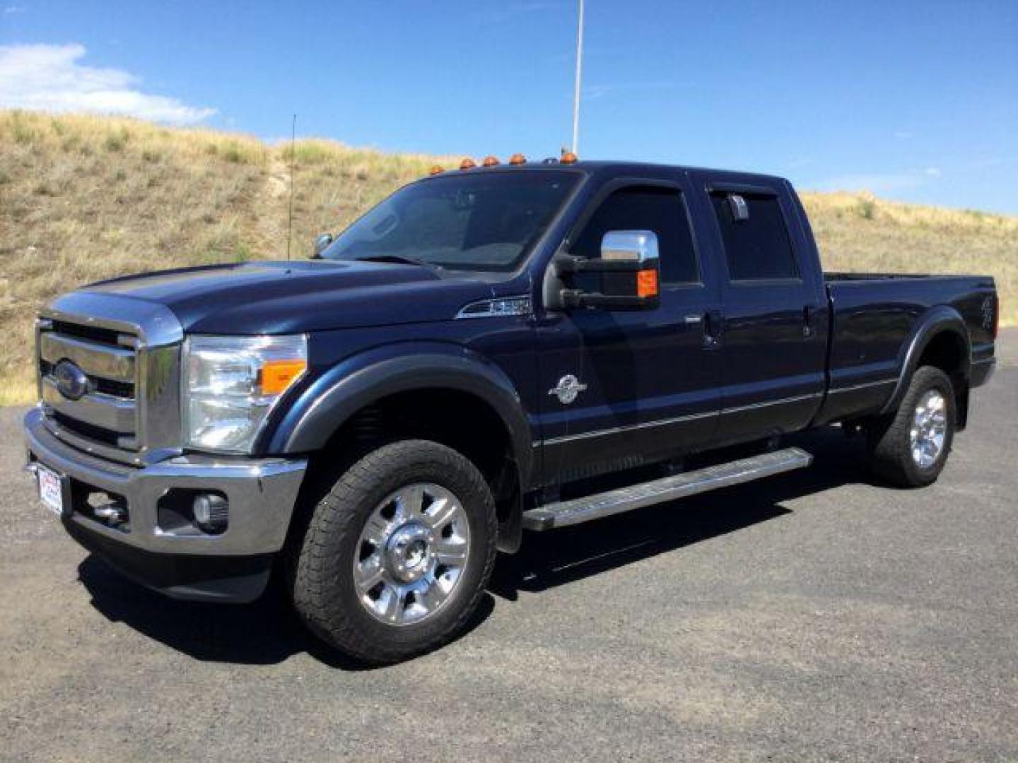 2015 Blue Jeans Metallic /BLACK LEATHER Ford F-350 SD Lariat Crew Cab Long Bed 4WD (1FT8W3BT8FE) with an 6.7L V8 OHV 16V DIESEL engine, 6-Speed Automatic transmission, located at 1801 Main Street, Lewiston, 83501, (208) 743-9371, 46.417065, -117.004799 - Photo#0