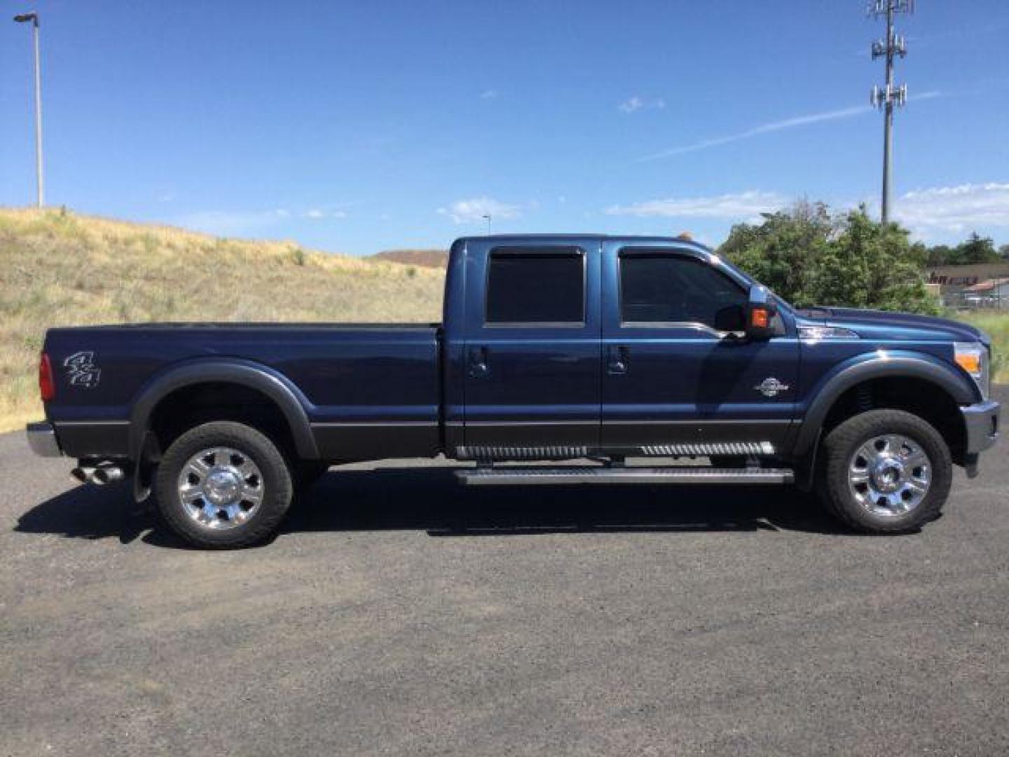 2015 Blue Jeans Metallic /BLACK LEATHER Ford F-350 SD Lariat Crew Cab Long Bed 4WD (1FT8W3BT8FE) with an 6.7L V8 OHV 16V DIESEL engine, 6-Speed Automatic transmission, located at 1801 Main Street, Lewiston, 83501, (208) 743-9371, 46.417065, -117.004799 - Photo#11