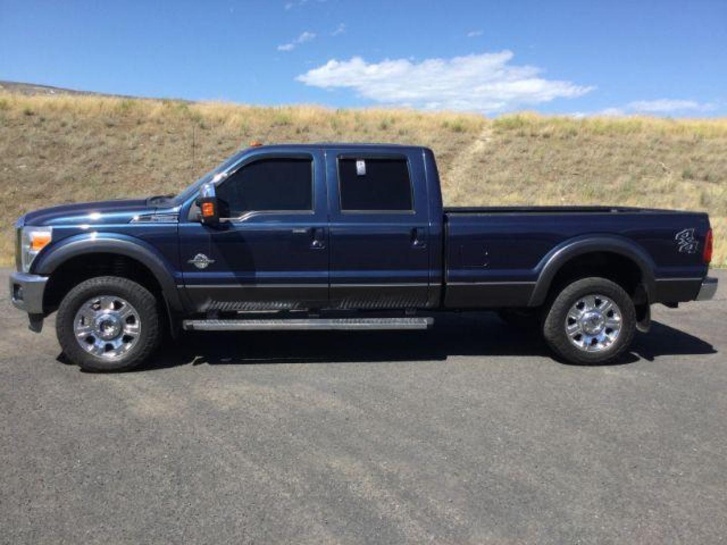 2015 Blue Jeans Metallic /BLACK LEATHER Ford F-350 SD Lariat Crew Cab Long Bed 4WD (1FT8W3BT8FE) with an 6.7L V8 OHV 16V DIESEL engine, 6-Speed Automatic transmission, located at 1801 Main Street, Lewiston, 83501, (208) 743-9371, 46.417065, -117.004799 - Photo#1