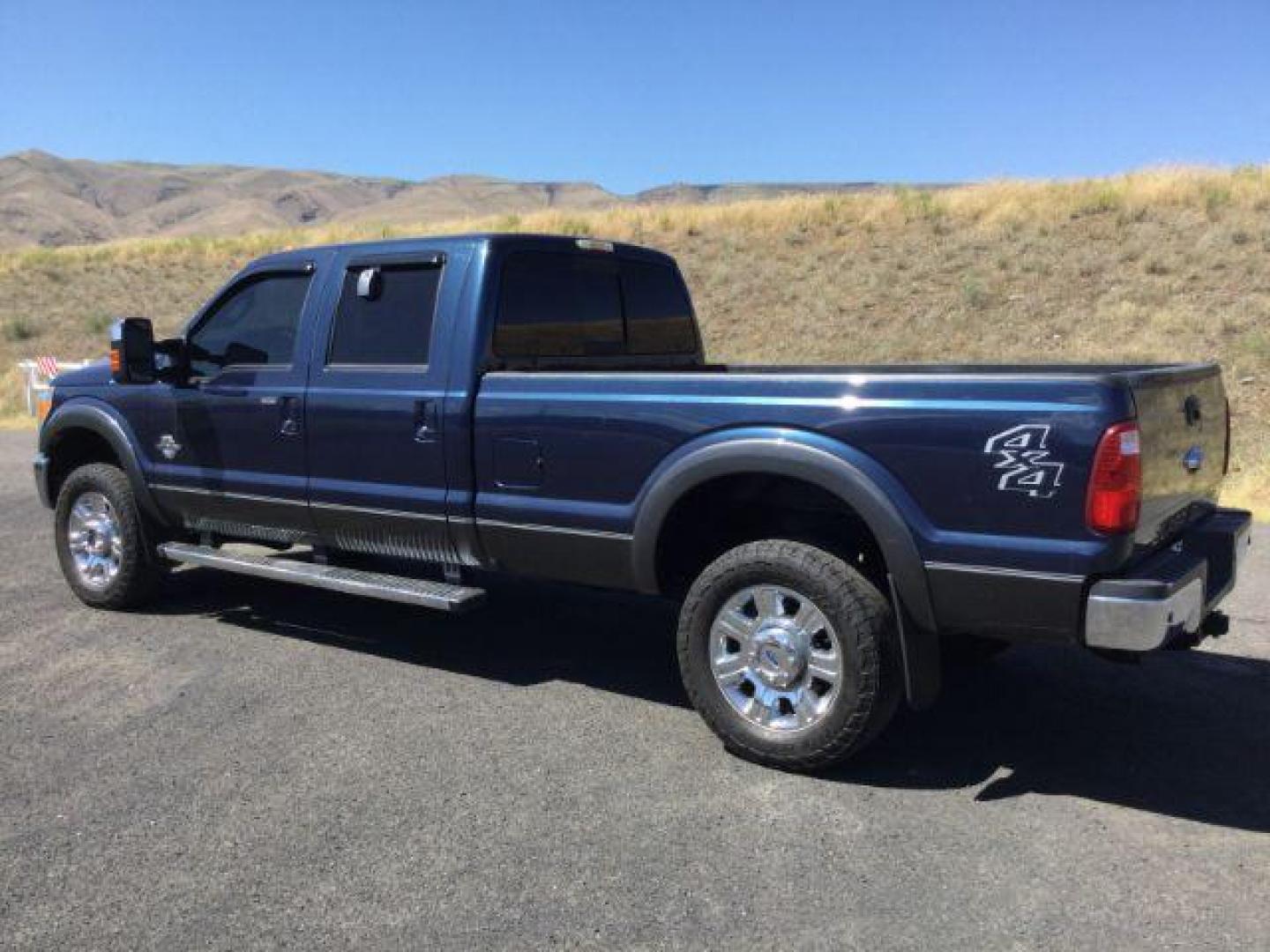 2015 Blue Jeans Metallic /BLACK LEATHER Ford F-350 SD Lariat Crew Cab Long Bed 4WD (1FT8W3BT8FE) with an 6.7L V8 OHV 16V DIESEL engine, 6-Speed Automatic transmission, located at 1801 Main Street, Lewiston, 83501, (208) 743-9371, 46.417065, -117.004799 - Photo#2