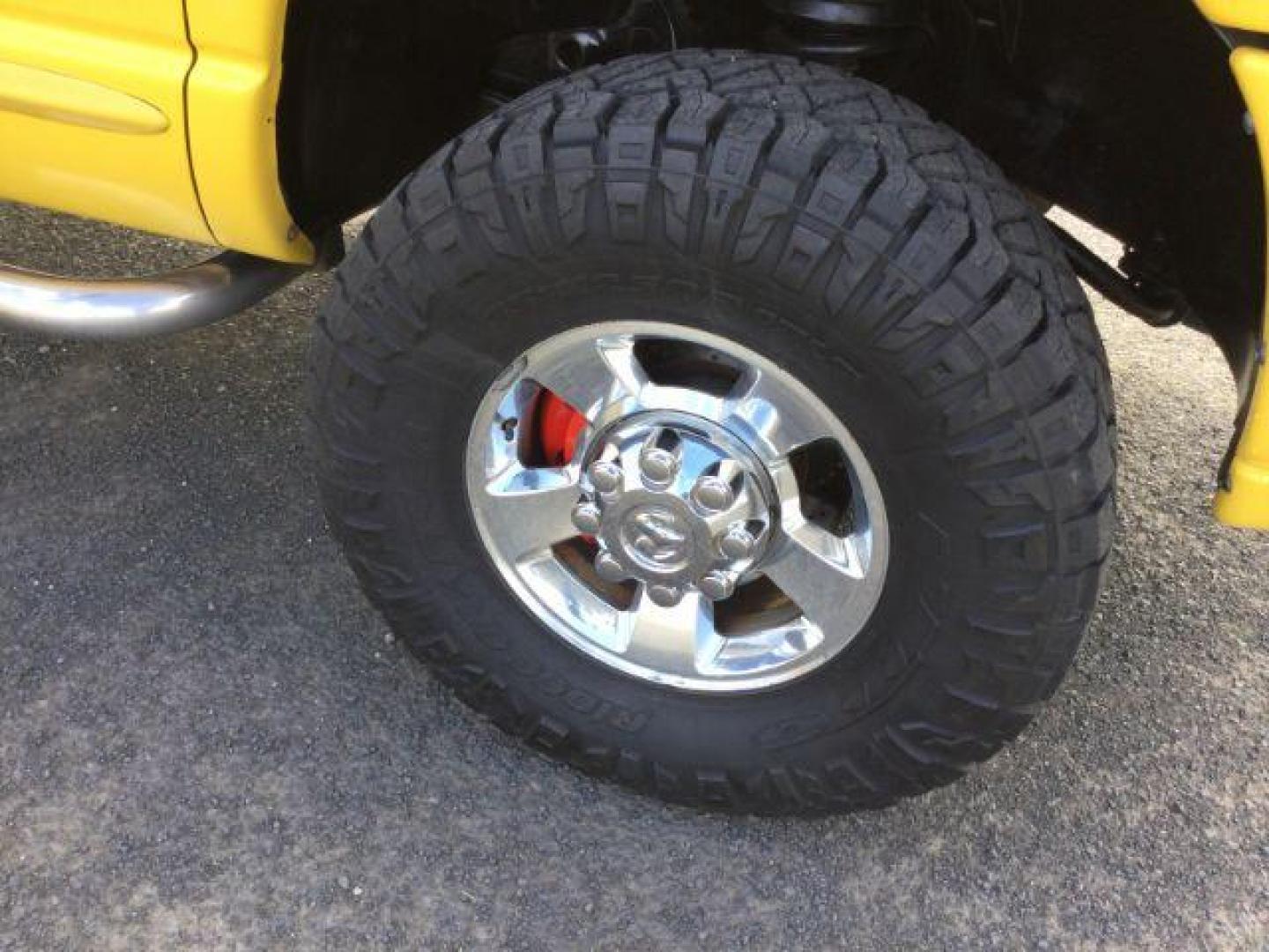 2005 Solar Yellow /Dark Slate Gray Leather Interior Dodge Ram 3500 Laramie Quad Cab Short Bed 4WD (3D7LS38C55G) with an 5.9L L6 OHV 24V TURBO DIESEL engine, 6-Speed Manual transmission, located at 1801 Main Street, Lewiston, 83501, (208) 743-9371, 46.417065, -117.004799 - Photo#15