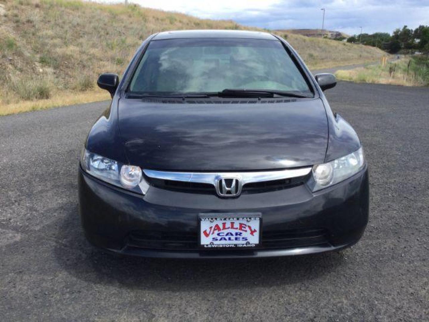 2006 Nighthawk Black Pearl /Ivory Cloth Interior Honda Civic EX Sedan AT (1HGFA16836L) with an 1.8L L4 SOHC 16V engine, 5-Speed Automatic transmission, located at 1801 Main Street, Lewiston, 83501, (208) 743-9371, 46.417065, -117.004799 - Photo#8