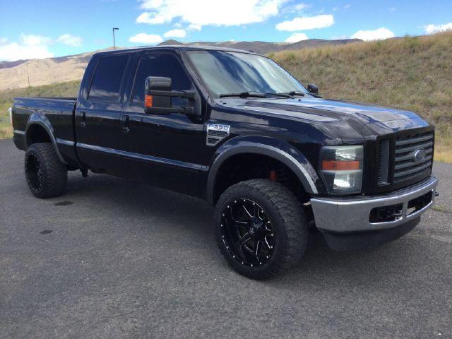 2008 Black /Ebony Leather Interior Ford F-350 SD Lariat Crew Cab 4WD (1FTWW31R28E) with an 6.4L V8 OHV 32V TURBO DIESEL engine, 5-Speed Automatic transmission, located at 1801 Main Street, Lewiston, 83501, (208) 743-9371, 46.417065, -117.004799 - Photo#11