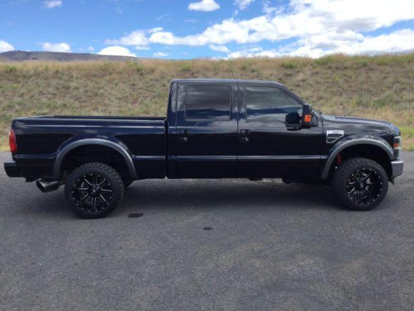 2008 Black /Ebony Leather Interior Ford F-350 SD Lariat Crew Cab 4WD (1FTWW31R28E) with an 6.4L V8 OHV 32V TURBO DIESEL engine, 5-Speed Automatic transmission, located at 1801 Main Street, Lewiston, 83501, (208) 743-9371, 46.417065, -117.004799 - Photo#12