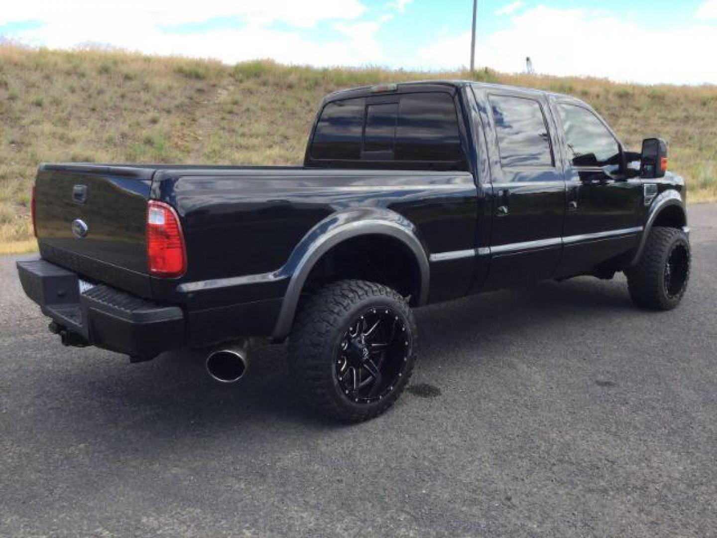 2008 Black /Ebony Leather Interior Ford F-350 SD Lariat Crew Cab 4WD (1FTWW31R28E) with an 6.4L V8 OHV 32V TURBO DIESEL engine, 5-Speed Automatic transmission, located at 1801 Main Street, Lewiston, 83501, (208) 743-9371, 46.417065, -117.004799 - Photo#13