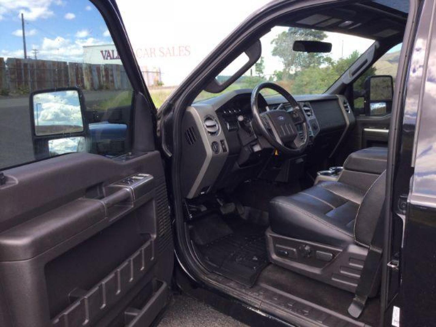 2008 Black /Ebony Leather Interior Ford F-350 SD Lariat Crew Cab 4WD (1FTWW31R28E) with an 6.4L V8 OHV 32V TURBO DIESEL engine, 5-Speed Automatic transmission, located at 1801 Main Street, Lewiston, 83501, (208) 743-9371, 46.417065, -117.004799 - Photo#3