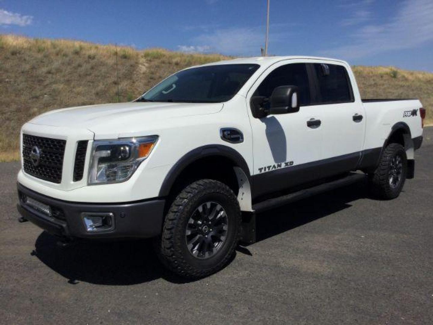 2016 Pearl White /Black, leather Nissan Titan XD PRO-4X 4WD Diesel (1N6BA1F43GN) with an 5.0L V8 DOHC 32V DIESEL engine, 6-Speed Automatic transmission, located at 1801 Main Street, Lewiston, 83501, (208) 743-9371, 46.417065, -117.004799 - Photo#0