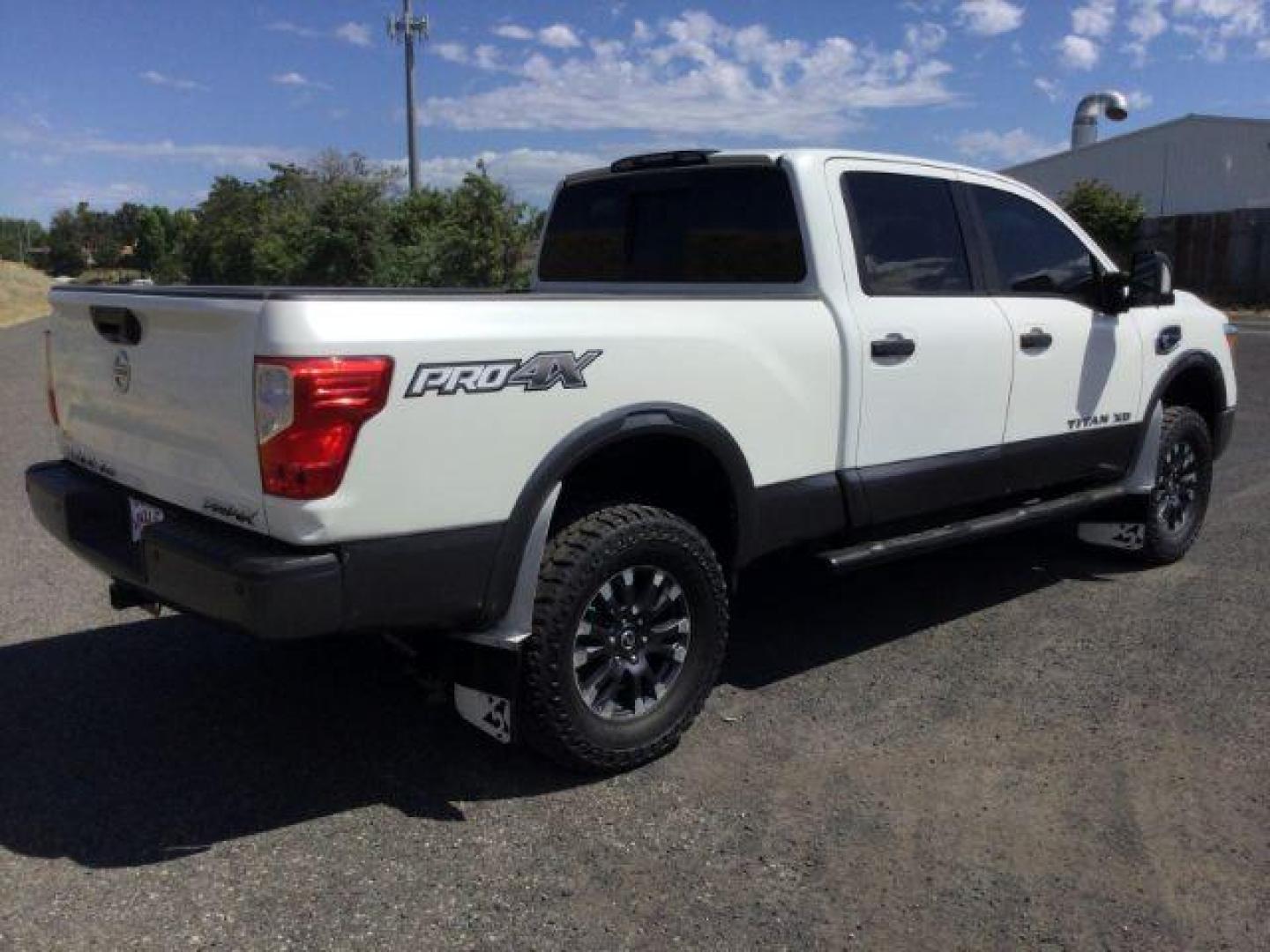 2016 Pearl White /Black, leather Nissan Titan XD PRO-4X 4WD Diesel (1N6BA1F43GN) with an 5.0L V8 DOHC 32V DIESEL engine, 6-Speed Automatic transmission, located at 1801 Main Street, Lewiston, 83501, (208) 743-9371, 46.417065, -117.004799 - Photo#11