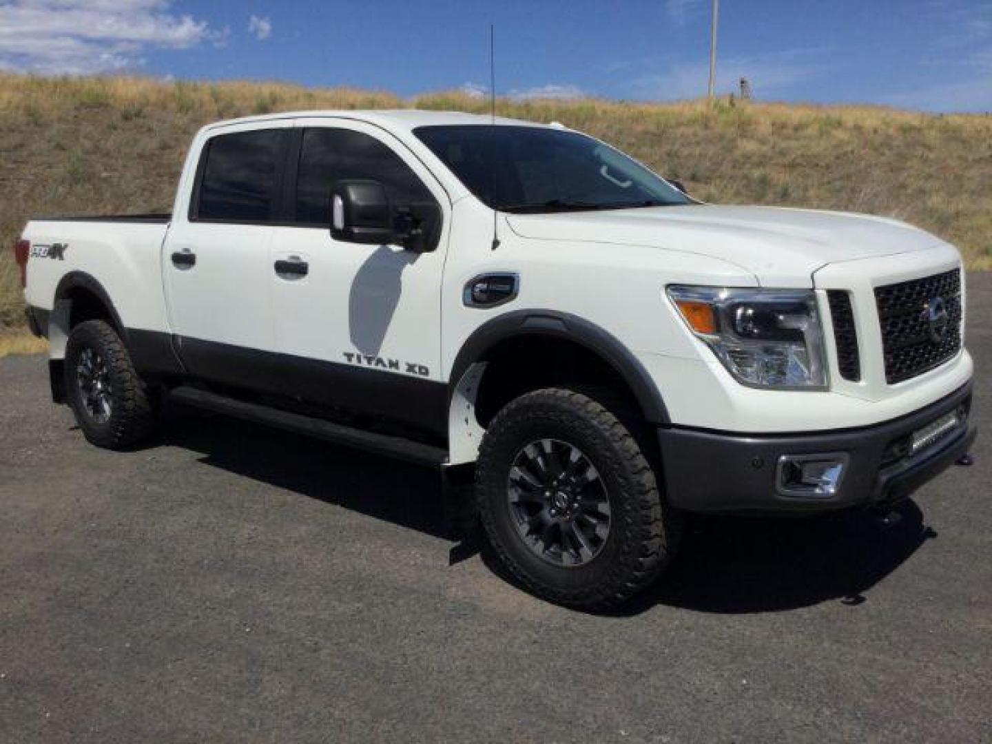 2016 Pearl White /Black, leather Nissan Titan XD PRO-4X 4WD Diesel (1N6BA1F43GN) with an 5.0L V8 DOHC 32V DIESEL engine, 6-Speed Automatic transmission, located at 1801 Main Street, Lewiston, 83501, (208) 743-9371, 46.417065, -117.004799 - Photo#13