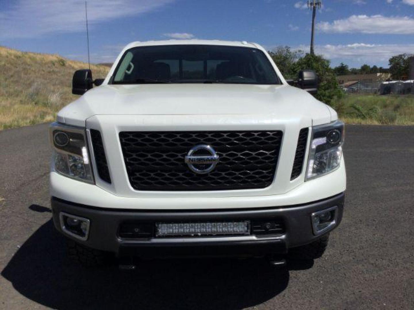 2016 Pearl White /Black, leather Nissan Titan XD PRO-4X 4WD Diesel (1N6BA1F43GN) with an 5.0L V8 DOHC 32V DIESEL engine, 6-Speed Automatic transmission, located at 1801 Main Street, Lewiston, 83501, (208) 743-9371, 46.417065, -117.004799 - Photo#14