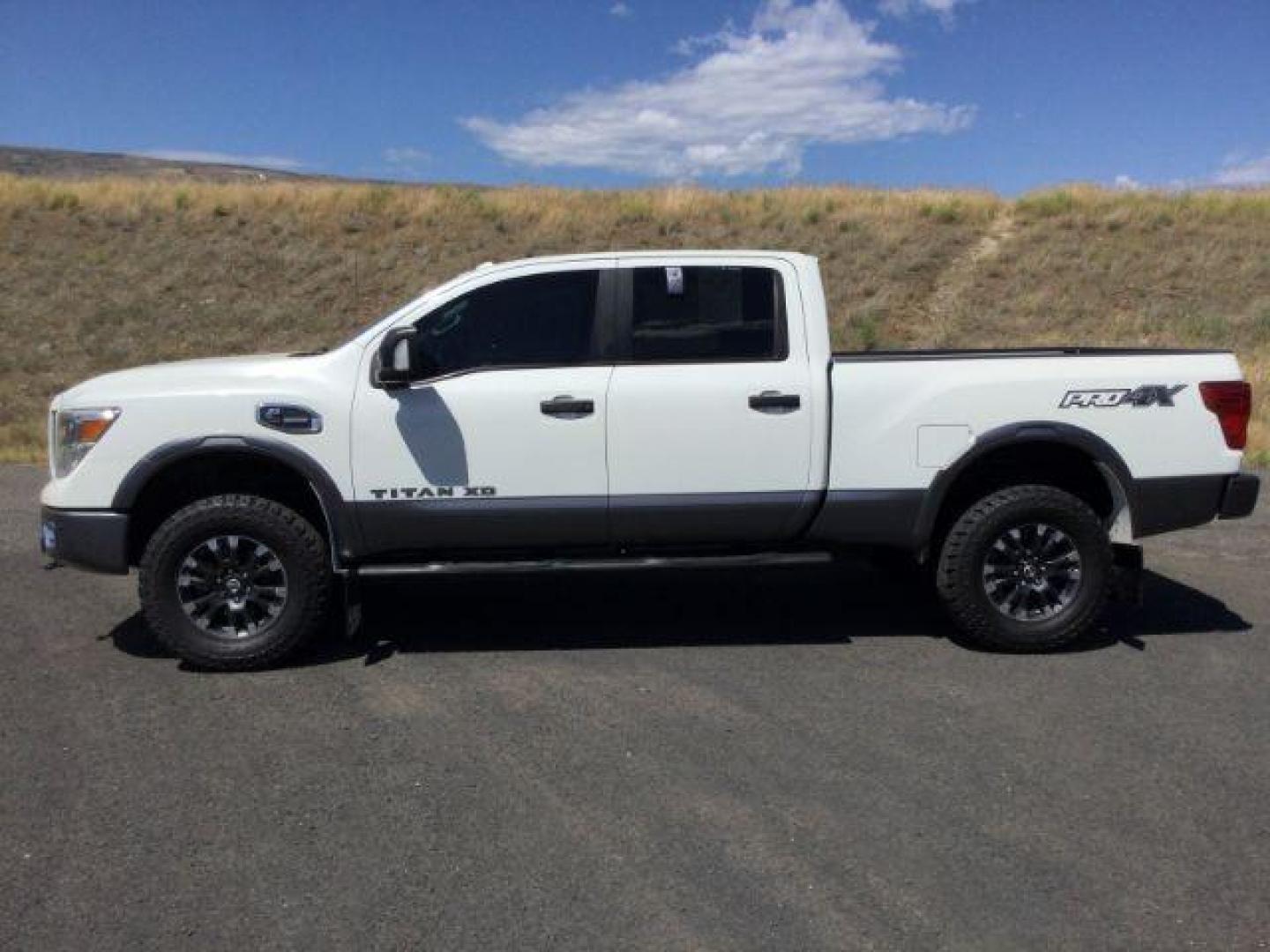 2016 Pearl White /Black, leather Nissan Titan XD PRO-4X 4WD Diesel (1N6BA1F43GN) with an 5.0L V8 DOHC 32V DIESEL engine, 6-Speed Automatic transmission, located at 1801 Main Street, Lewiston, 83501, (208) 743-9371, 46.417065, -117.004799 - Photo#1