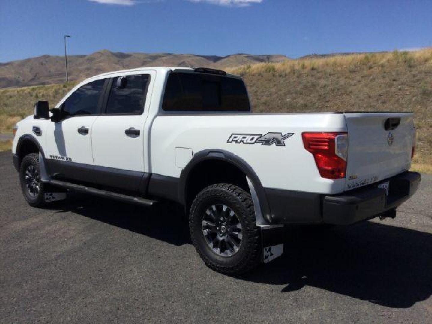 2016 Pearl White /Black, leather Nissan Titan XD PRO-4X 4WD Diesel (1N6BA1F43GN) with an 5.0L V8 DOHC 32V DIESEL engine, 6-Speed Automatic transmission, located at 1801 Main Street, Lewiston, 83501, (208) 743-9371, 46.417065, -117.004799 - Photo#2