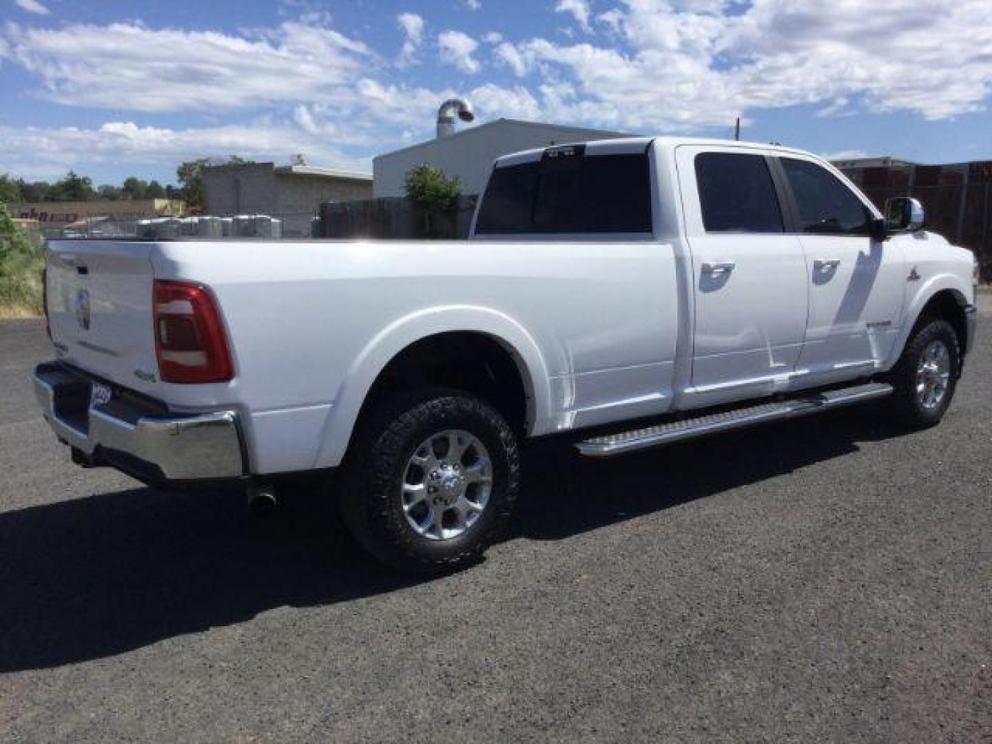 2019 Bright White Clear Coat /Black, leather RAM 3500 Laramie Crew Cab LWB 4WD (3C63R3JL1KG) with an 6.7L L6 OHV 24V TURBO DIESEL engine, 6-Speed Automatic transmission, located at 1801 Main Street, Lewiston, 83501, (208) 743-9371, 46.417065, -117.004799 - Photo#9