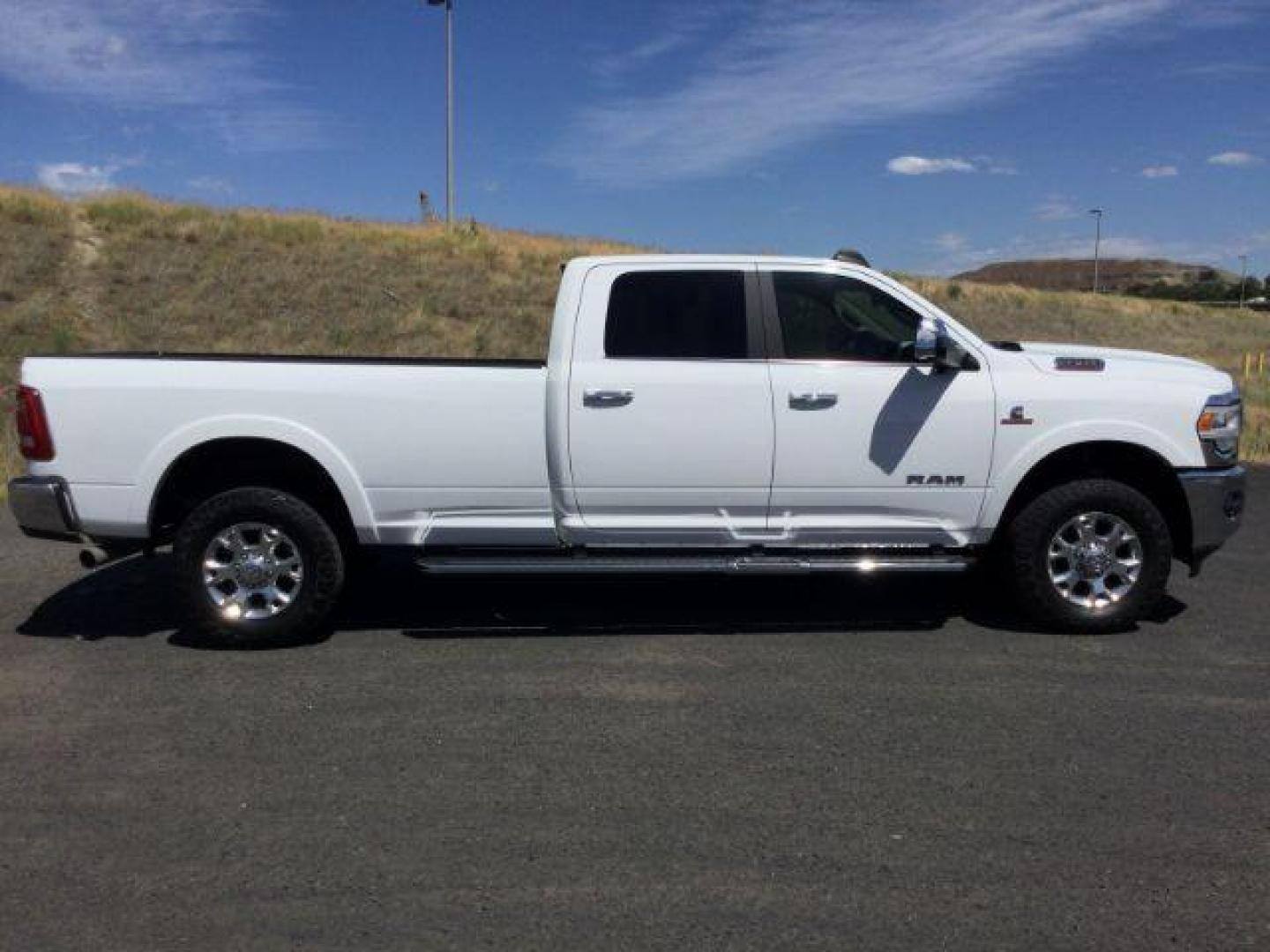 2019 Bright White Clear Coat /Black, leather RAM 3500 Laramie Crew Cab LWB 4WD (3C63R3JL1KG) with an 6.7L L6 OHV 24V TURBO DIESEL engine, 6-Speed Automatic transmission, located at 1801 Main Street, Lewiston, 83501, (208) 743-9371, 46.417065, -117.004799 - Photo#10