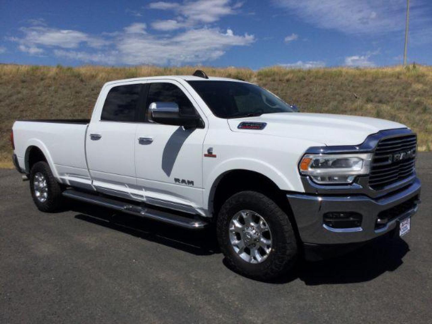 2019 Bright White Clear Coat /Black, leather RAM 3500 Laramie Crew Cab LWB 4WD (3C63R3JL1KG) with an 6.7L L6 OHV 24V TURBO DIESEL engine, 6-Speed Automatic transmission, located at 1801 Main Street, Lewiston, 83501, (208) 743-9371, 46.417065, -117.004799 - Photo#11