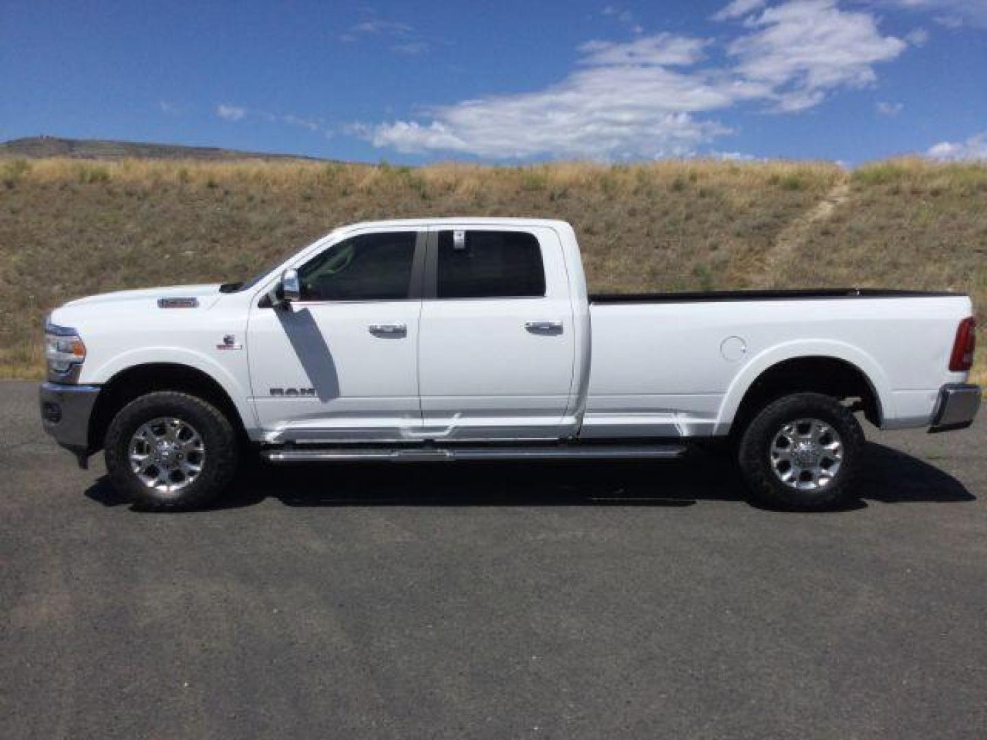 2019 Bright White Clear Coat /Black, leather RAM 3500 Laramie Crew Cab LWB 4WD (3C63R3JL1KG) with an 6.7L L6 OHV 24V TURBO DIESEL engine, 6-Speed Automatic transmission, located at 1801 Main Street, Lewiston, 83501, (208) 743-9371, 46.417065, -117.004799 - Photo#1