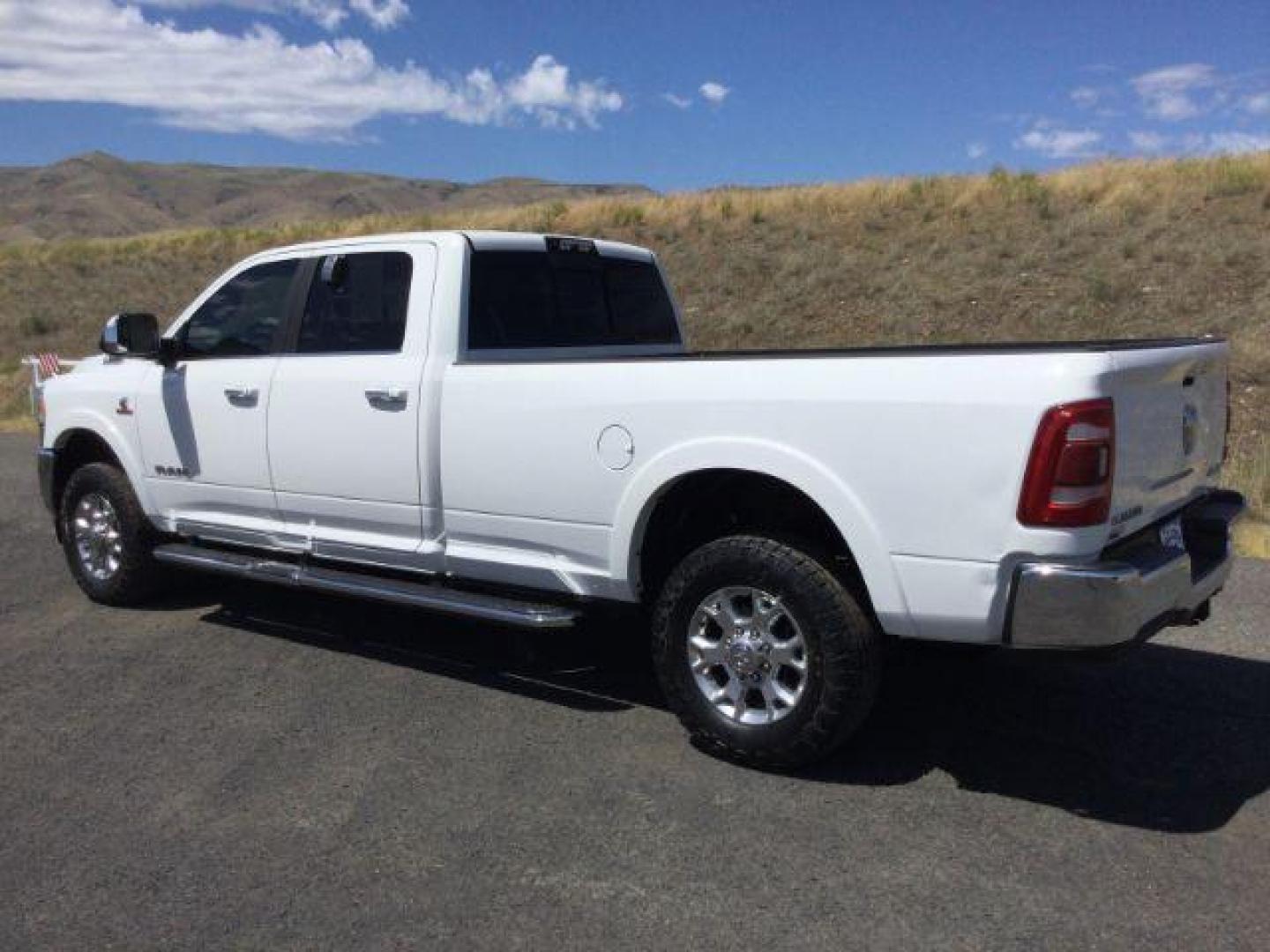 2019 Bright White Clear Coat /Black, leather RAM 3500 Laramie Crew Cab LWB 4WD (3C63R3JL1KG) with an 6.7L L6 OHV 24V TURBO DIESEL engine, 6-Speed Automatic transmission, located at 1801 Main Street, Lewiston, 83501, (208) 743-9371, 46.417065, -117.004799 - Photo#2