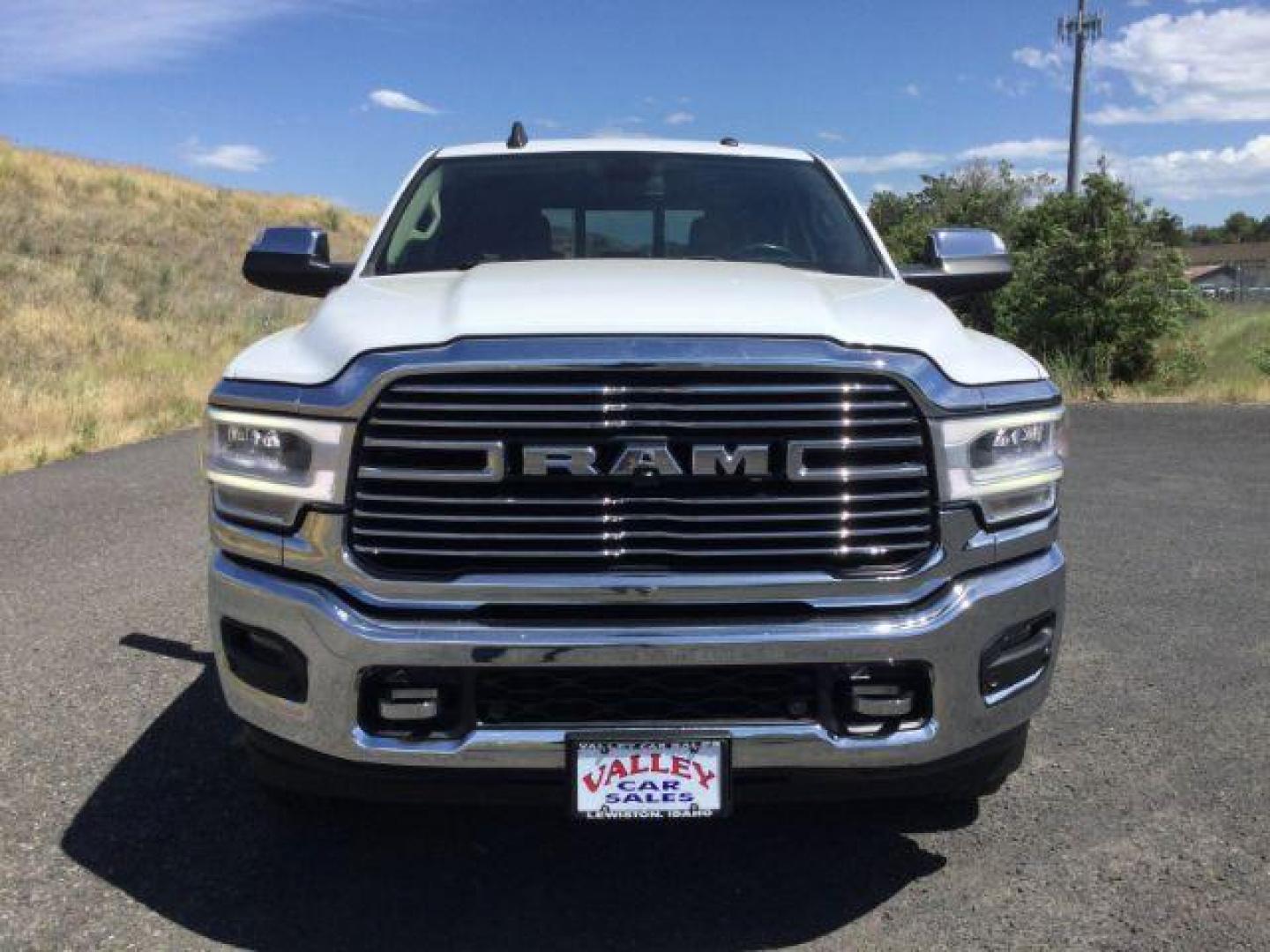 2019 Bright White Clear Coat /Black, leather RAM 3500 Laramie Crew Cab LWB 4WD (3C63R3JL1KG) with an 6.7L L6 OHV 24V TURBO DIESEL engine, 6-Speed Automatic transmission, located at 1801 Main Street, Lewiston, 83501, (208) 743-9371, 46.417065, -117.004799 - Photo#3