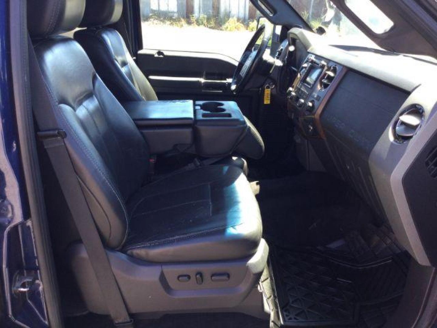 2011 Dark Blue Pearl /Black Leather Interior Ford F-350 SD Lariat Crew Cab Long Bed 4WD (1FT8W3BT8BE) with an 6.7L V8 OHV 16V DIESEL engine, 6-Speed Automatic transmission, located at 1801 Main Street, Lewiston, 83501, (208) 743-9371, 46.417065, -117.004799 - Photo#9