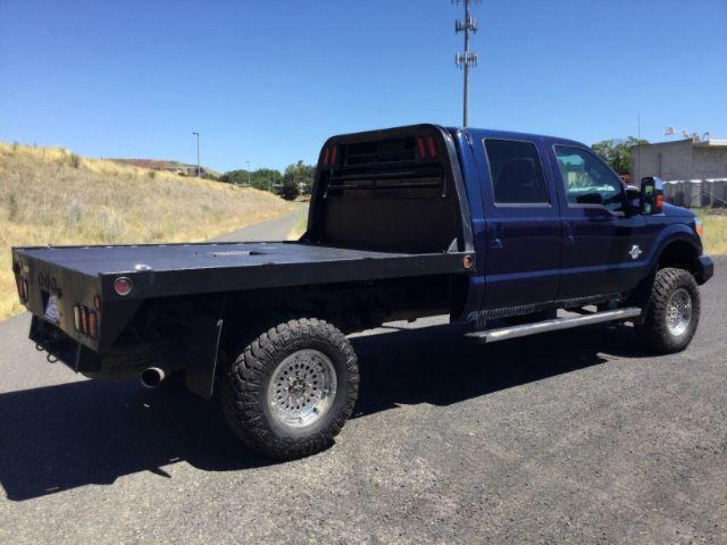 2011 Dark Blue Pearl /Black Leather Interior Ford F-350 SD Lariat Crew Cab Long Bed 4WD (1FT8W3BT8BE) with an 6.7L V8 OHV 16V DIESEL engine, 6-Speed Automatic transmission, located at 1801 Main Street, Lewiston, 83501, (208) 743-9371, 46.417065, -117.004799 - Photo#14