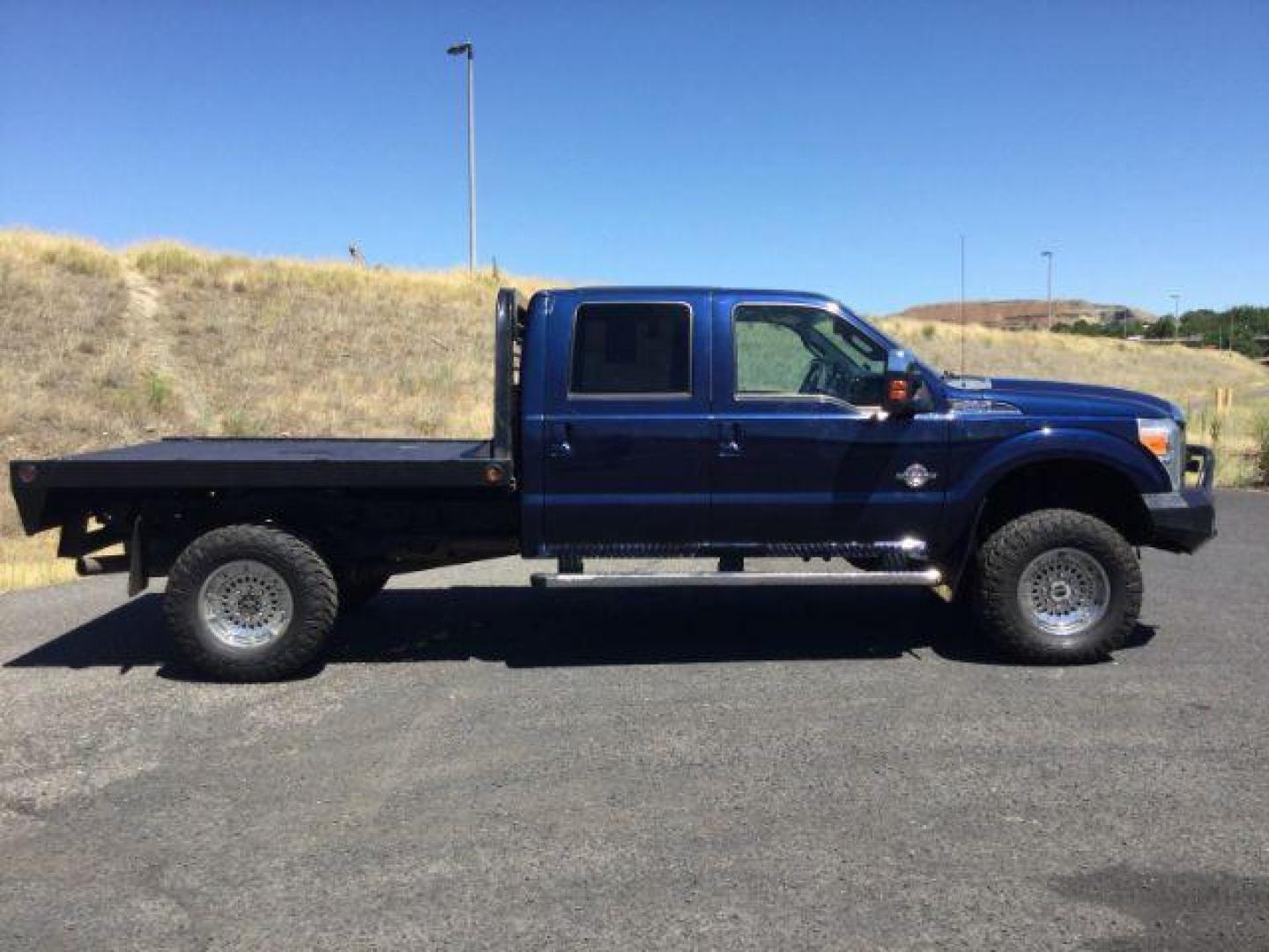 2011 Dark Blue Pearl /Black Leather Interior Ford F-350 SD Lariat Crew Cab Long Bed 4WD (1FT8W3BT8BE) with an 6.7L V8 OHV 16V DIESEL engine, 6-Speed Automatic transmission, located at 1801 Main Street, Lewiston, 83501, (208) 743-9371, 46.417065, -117.004799 - Photo#15