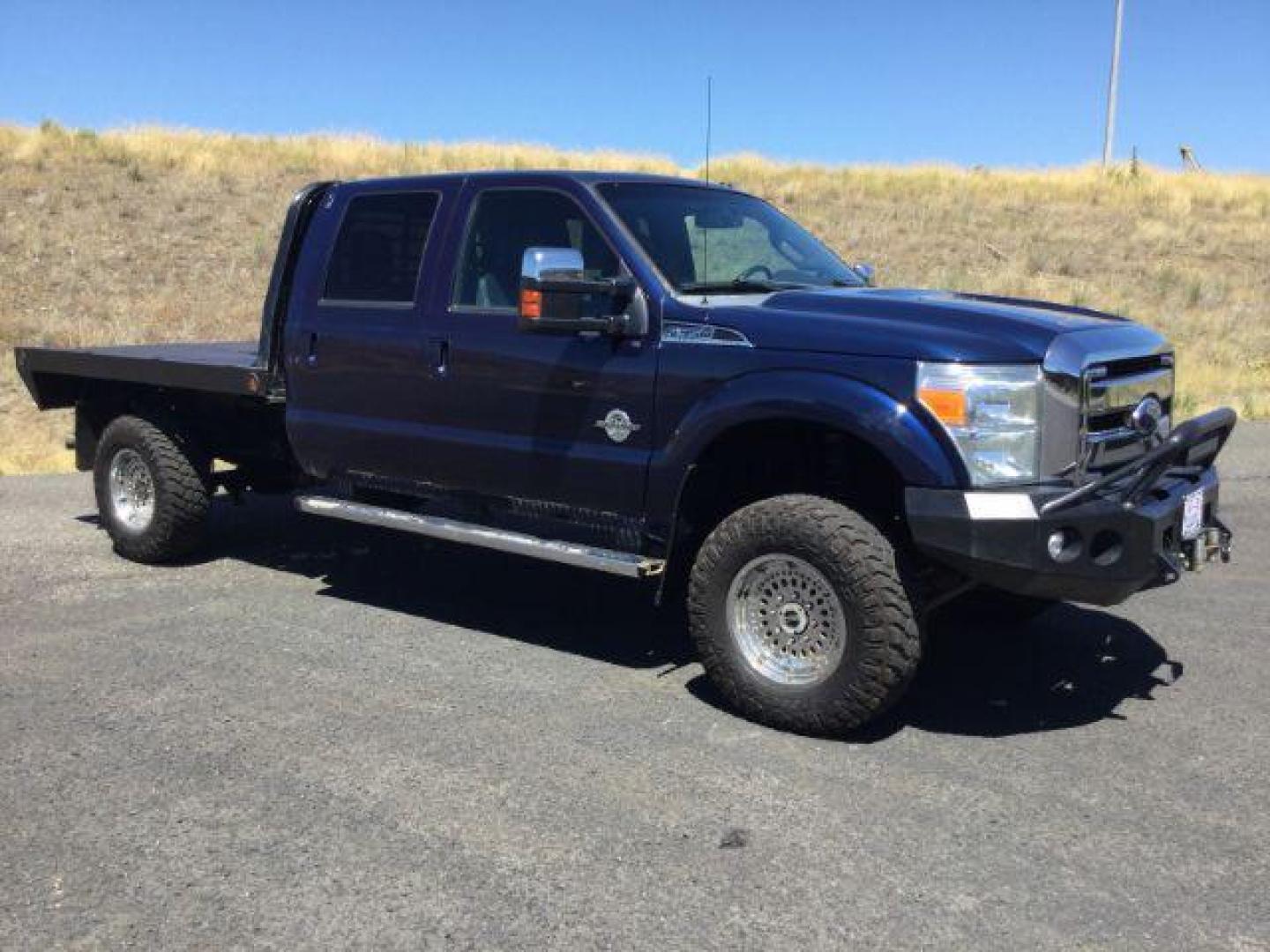 2011 Dark Blue Pearl /Black Leather Interior Ford F-350 SD Lariat Crew Cab Long Bed 4WD (1FT8W3BT8BE) with an 6.7L V8 OHV 16V DIESEL engine, 6-Speed Automatic transmission, located at 1801 Main Street, Lewiston, 83501, (208) 743-9371, 46.417065, -117.004799 - Photo#16