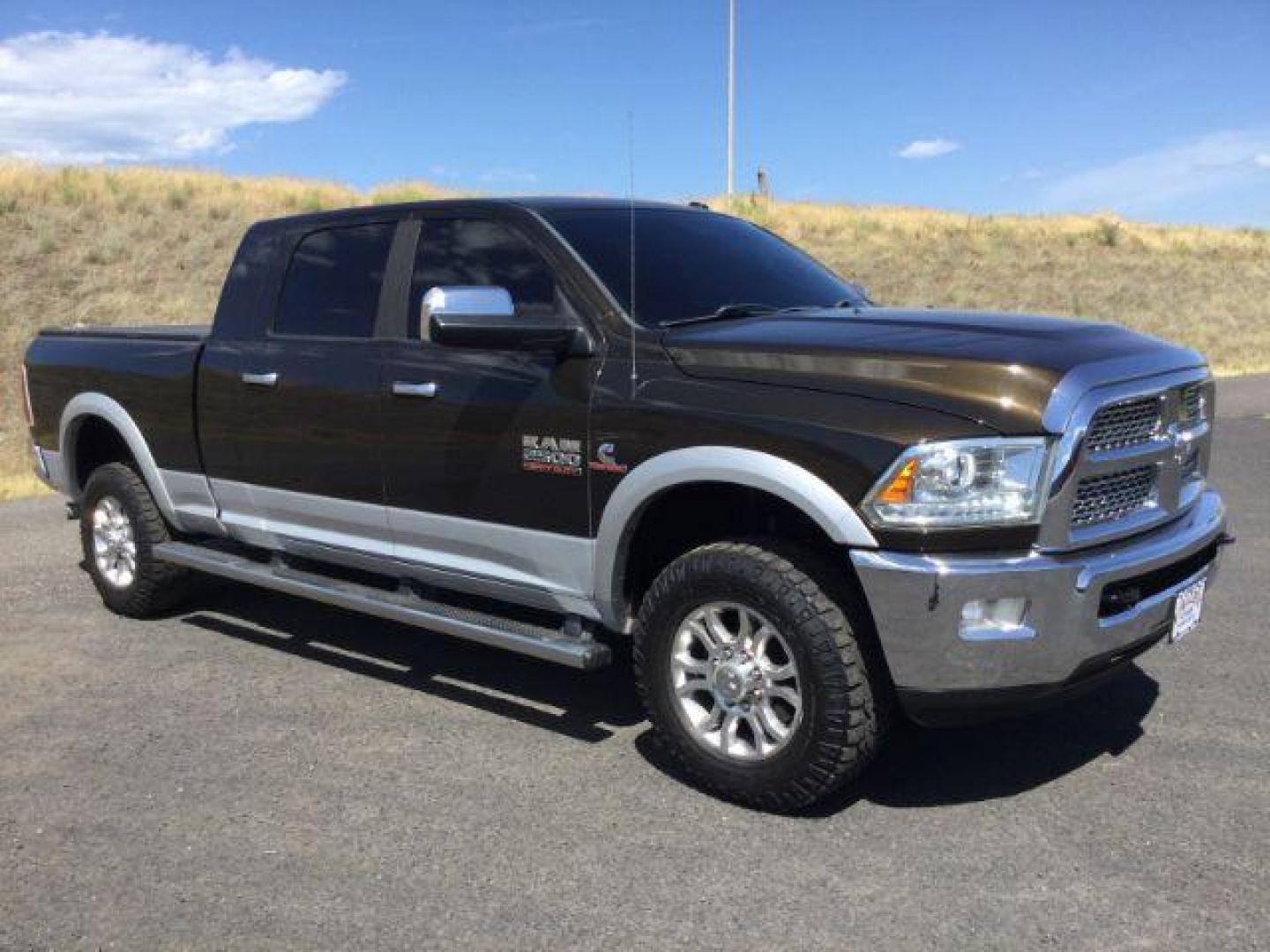 2014 Black Gold Pearlcoat /Black RAM 2500 Laramie Mega Cab 4WD (3C6UR5NL4EG) with an 6.7L L6 OHV 24V TURBO DIESEL engine, 6-Speed Automatic transmission, located at 1801 Main Street, Lewiston, 83501, (208) 743-9371, 46.417065, -117.004799 - Photo#10