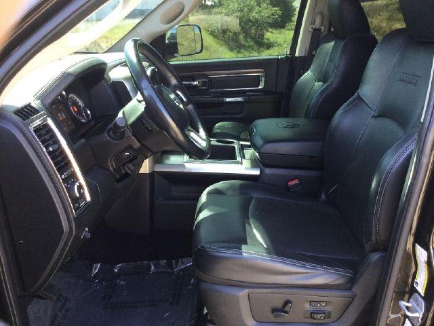 2014 Black Gold Pearlcoat /Black RAM 2500 Laramie Mega Cab 4WD (3C6UR5NL4EG) with an 6.7L L6 OHV 24V TURBO DIESEL engine, 6-Speed Automatic transmission, located at 1801 Main Street, Lewiston, 83501, (208) 743-9371, 46.417065, -117.004799 - Photo#3