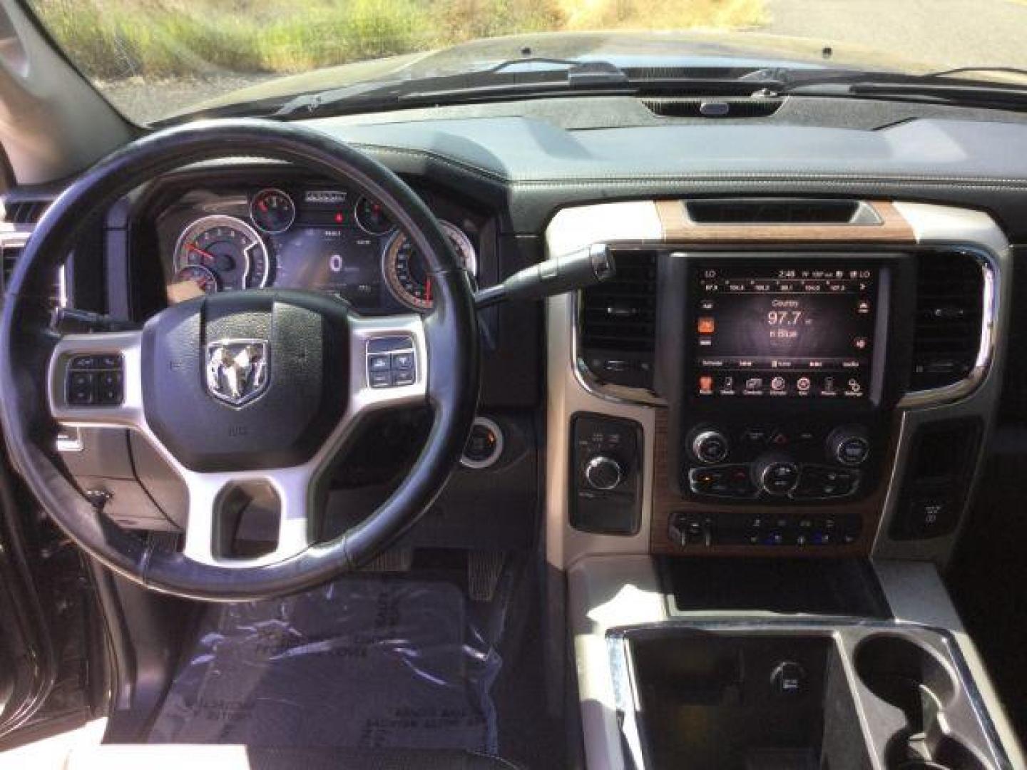 2014 Black Gold Pearlcoat /Black RAM 2500 Laramie Mega Cab 4WD (3C6UR5NL4EG) with an 6.7L L6 OHV 24V TURBO DIESEL engine, 6-Speed Automatic transmission, located at 1801 Main Street, Lewiston, 83501, (208) 743-9371, 46.417065, -117.004799 - Photo#7