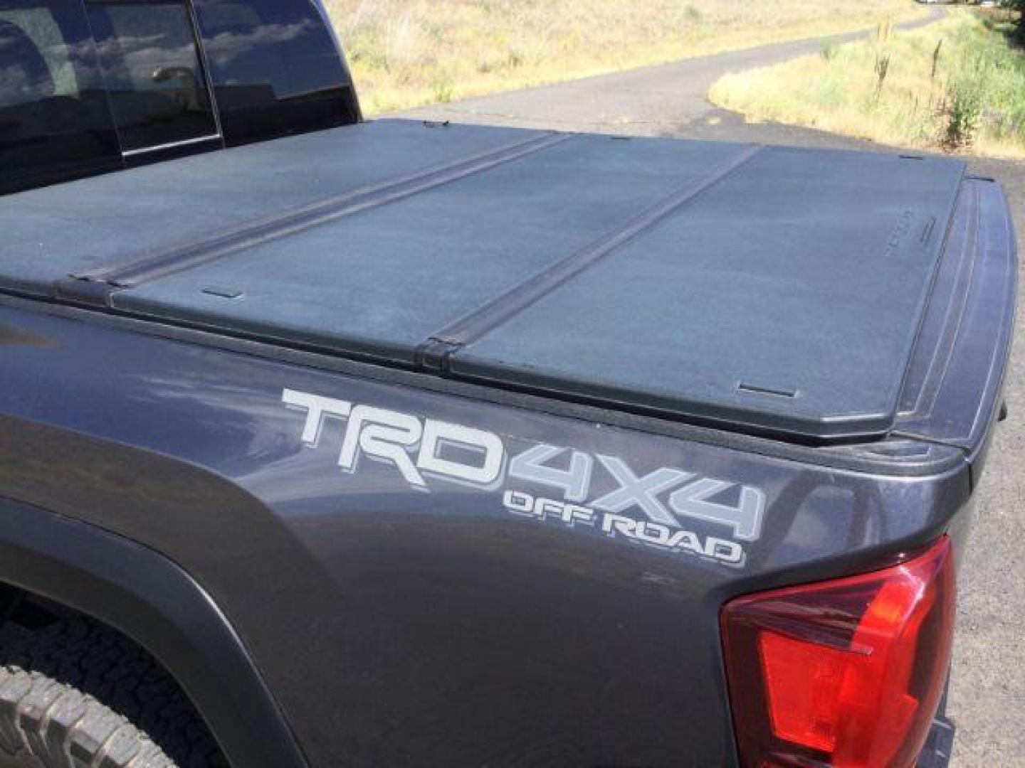 2019 Magnetic Gray Metallic /Black w/Caramel Accent Stitching, cloth Toyota Tacoma SR5 Double Cab Long Bed V6 6AT 4WD (5TFCZ5AN2KX) with an 3.5L V6 DOHC 24V engine, 6-Speed Manual Transmission transmission, located at 1801 Main Street, Lewiston, 83501, (208) 743-9371, 46.417065, -117.004799 - Photo#10