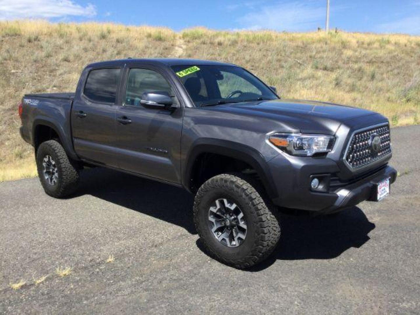 2019 Magnetic Gray Metallic /Black w/Caramel Accent Stitching, cloth Toyota Tacoma SR5 Double Cab Long Bed V6 6AT 4WD (5TFCZ5AN2KX) with an 3.5L V6 DOHC 24V engine, 6-Speed Manual Transmission transmission, located at 1801 Main Street, Lewiston, 83501, (208) 743-9371, 46.417065, -117.004799 - Photo#15