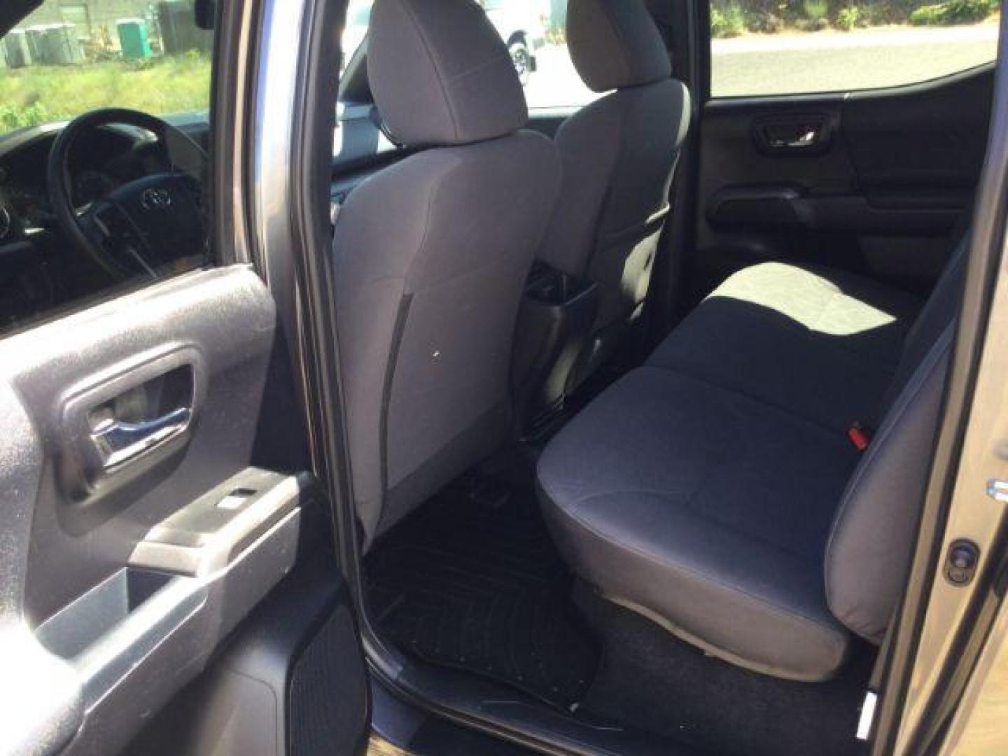 2019 Magnetic Gray Metallic /Black w/Caramel Accent Stitching, cloth Toyota Tacoma SR5 Double Cab Long Bed V6 6AT 4WD (5TFCZ5AN2KX) with an 3.5L V6 DOHC 24V engine, 6-Speed Manual Transmission transmission, located at 1801 Main Street, Lewiston, 83501, (208) 743-9371, 46.417065, -117.004799 - Photo#6