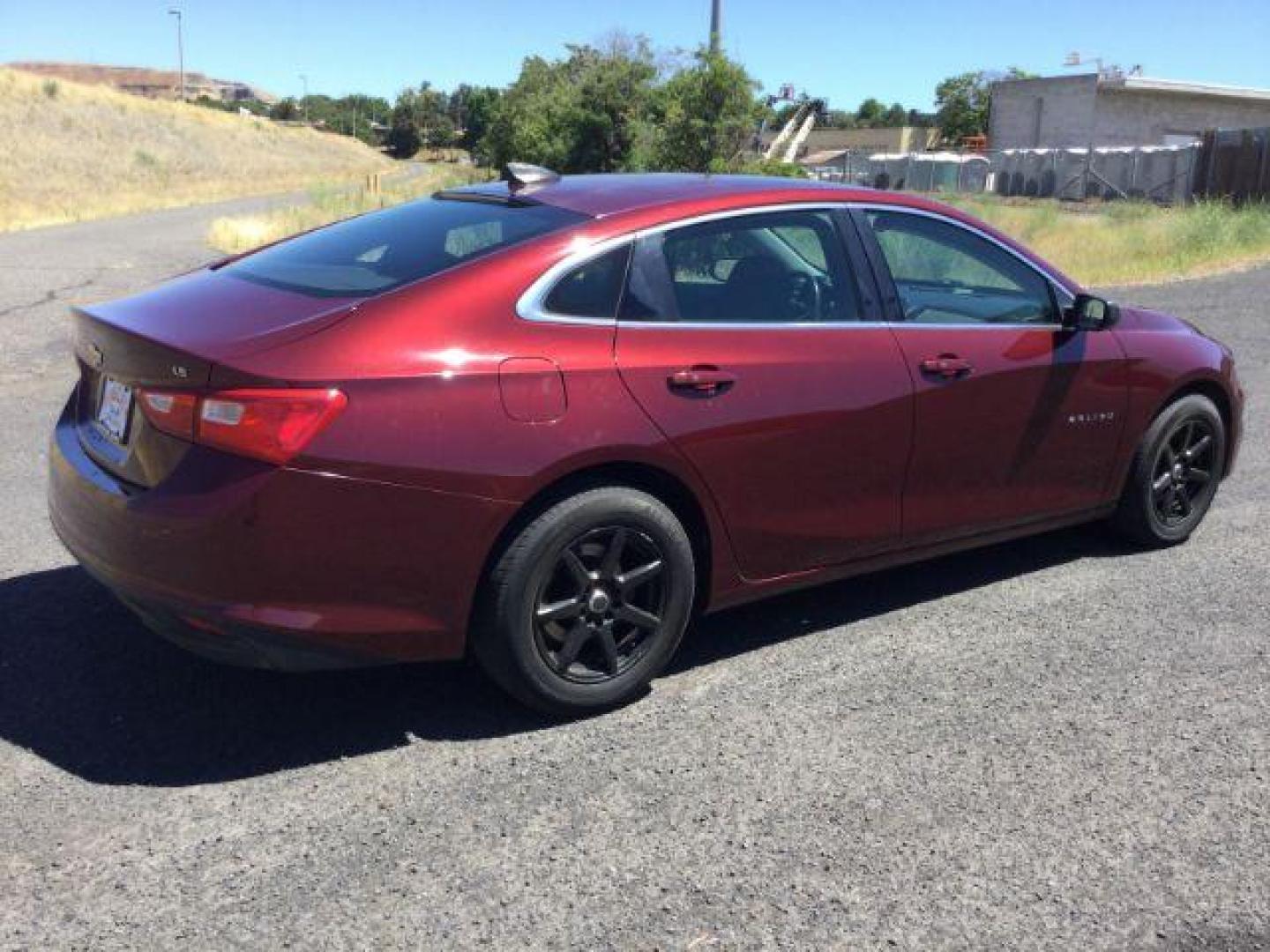 2016 Crystal Red Tintcoat /BLACK CLOTH Chevrolet Malibu LS (1G1ZB5ST5GF) with an 1.5L L4 DOHC 16V engine, 6-Speed Automatic transmission, located at 1801 Main Street, Lewiston, 83501, (208) 743-9371, 46.417065, -117.004799 - Photo#12