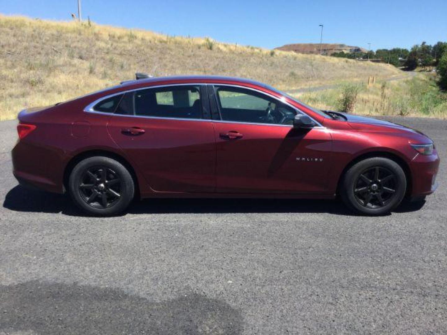 2016 Crystal Red Tintcoat /BLACK CLOTH Chevrolet Malibu LS (1G1ZB5ST5GF) with an 1.5L L4 DOHC 16V engine, 6-Speed Automatic transmission, located at 1801 Main Street, Lewiston, 83501, (208) 743-9371, 46.417065, -117.004799 - Photo#13