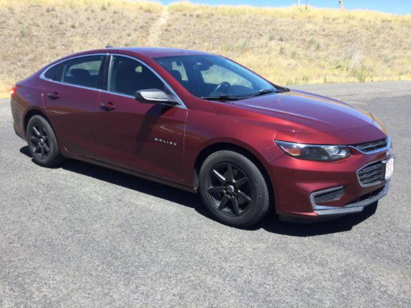 2016 Crystal Red Tintcoat /BLACK CLOTH Chevrolet Malibu LS (1G1ZB5ST5GF) with an 1.5L L4 DOHC 16V engine, 6-Speed Automatic transmission, located at 1801 Main Street, Lewiston, 83501, (208) 743-9371, 46.417065, -117.004799 - Photo#14