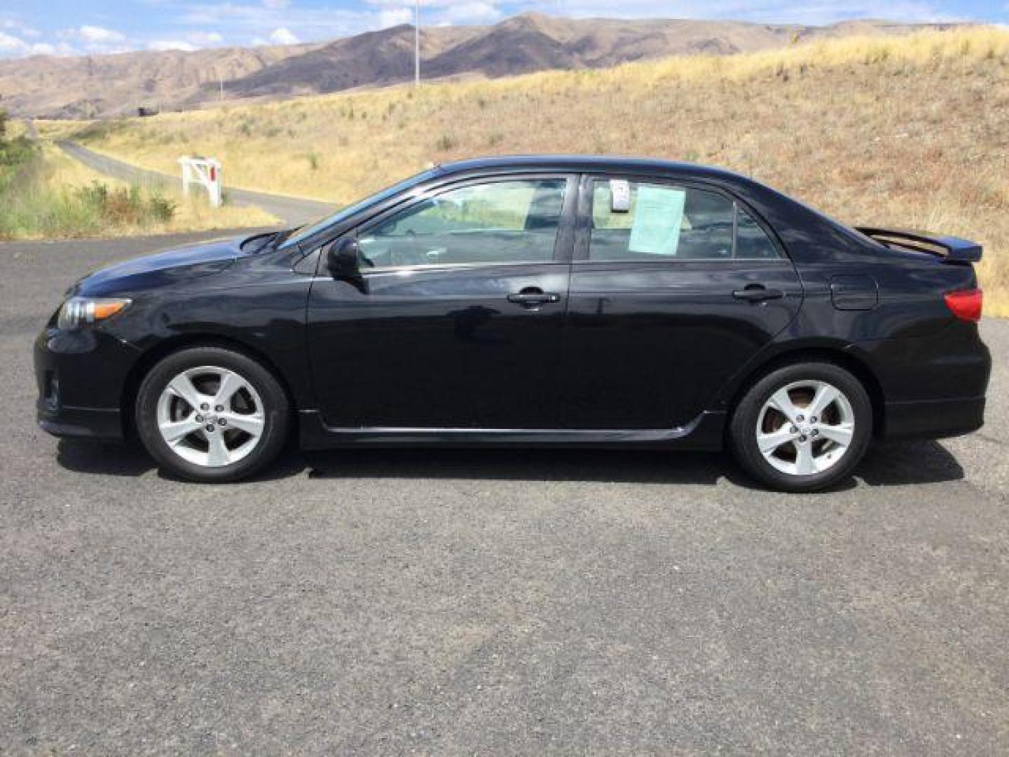 2013 Black Sand Pearl /Dark Charcoal Cloth Interior Toyota Corolla S 5-Speed MT (2T1BU4EE5DC) with an 1.8L L4 DOHC 16V engine, 5-Speed Manual transmission, located at 1801 Main Street, Lewiston, 83501, (208) 743-9371, 46.417065, -117.004799 - Photo#1