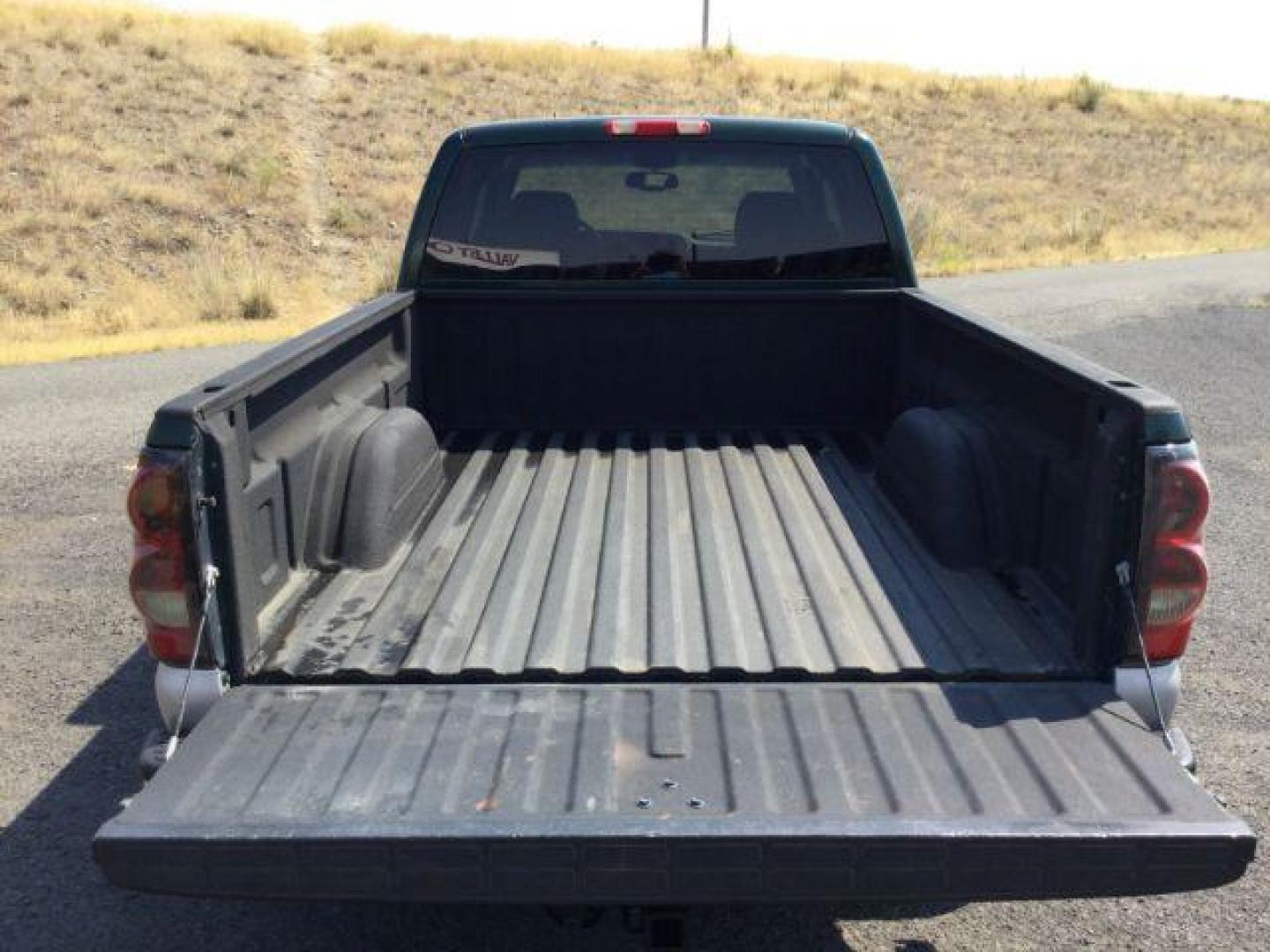 2005 Dark Green Metallic /Tan Leather Interior Chevrolet Silverado 1500 LT Ext. Cab Short Bed 4WD (1GCEK19B15Z) with an 5.3L V8 OHV 16V engine, 4-Speed Automatic transmission, located at 1801 Main Street, Lewiston, 83501, (208) 743-9371, 46.417065, -117.004799 - Photo#20