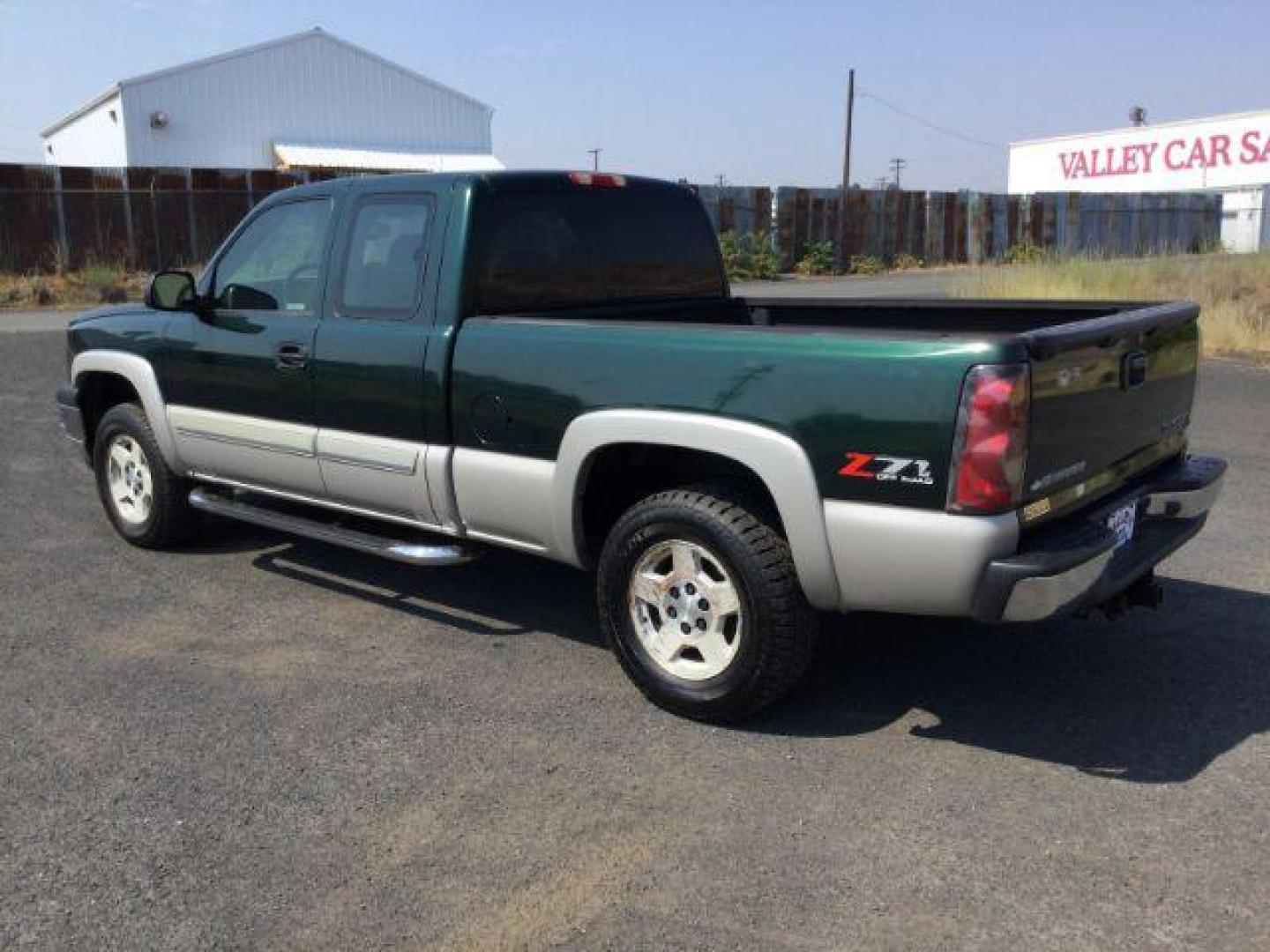 2005 Dark Green Metallic /Tan Leather Interior Chevrolet Silverado 1500 LT Ext. Cab Short Bed 4WD (1GCEK19B15Z) with an 5.3L V8 OHV 16V engine, 4-Speed Automatic transmission, located at 1801 Main Street, Lewiston, 83501, (208) 743-9371, 46.417065, -117.004799 - Photo#2