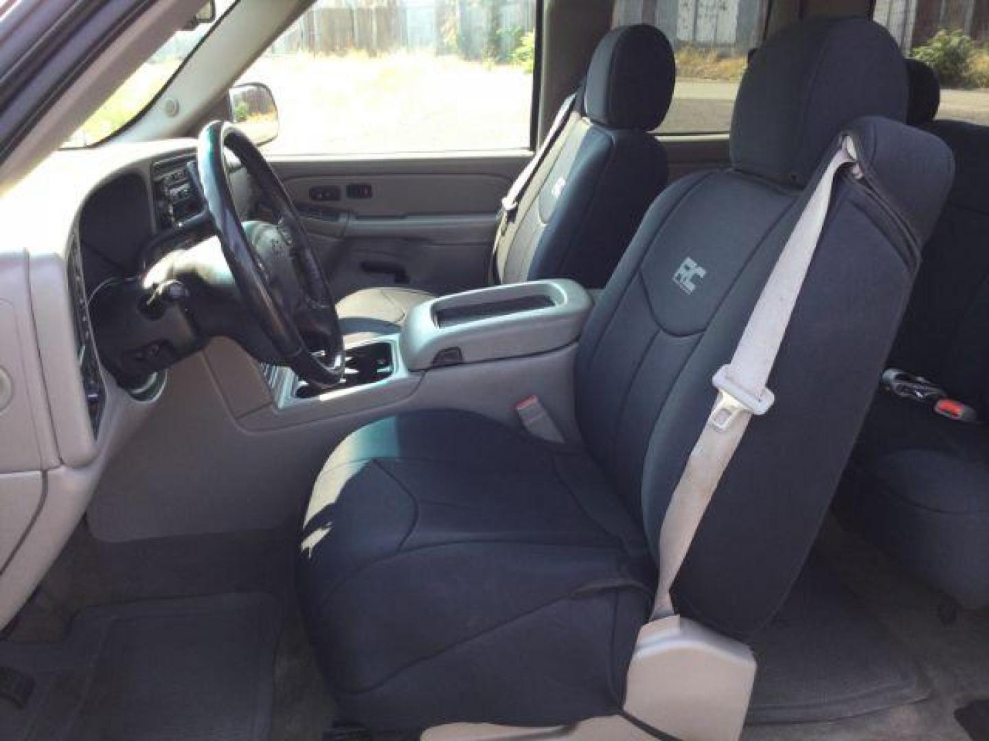 2005 Dark Green Metallic /Tan Leather Interior Chevrolet Silverado 1500 LT Ext. Cab Short Bed 4WD (1GCEK19B15Z) with an 5.3L V8 OHV 16V engine, 4-Speed Automatic transmission, located at 1801 Main Street, Lewiston, 83501, (208) 743-9371, 46.417065, -117.004799 - Photo#3