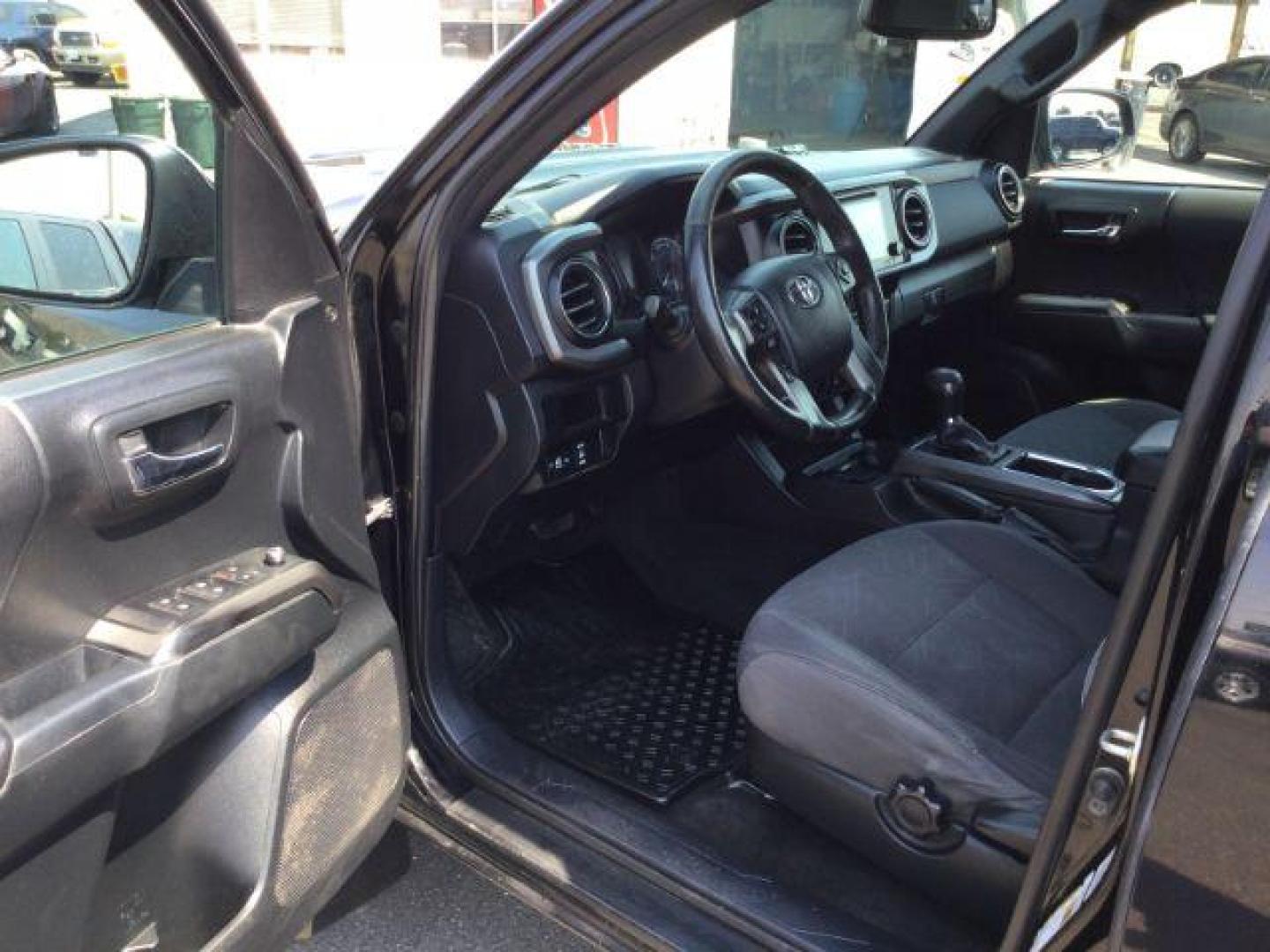 2016 Black /BLACK CLOTH Toyota Tacoma SR5 Double Cab Super Long Bed V6 6AT 4WD (5TFDZ5BN4GX) with an 3.5L V6 DOHC 24V engine, 6-Speed Automatic transmission, located at 1801 Main Street, Lewiston, 83501, (208) 743-9371, 46.417065, -117.004799 - Photo#3