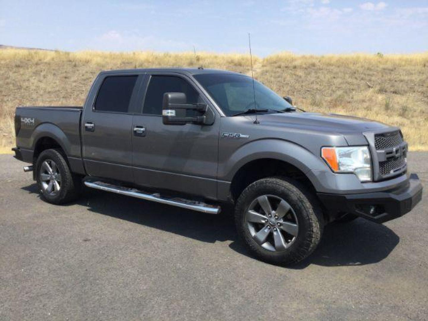 2012 Sterling Gray Metallic /Steel Gray Cloth Interior Ford F-150 XLT SuperCrew 5.5-ft. Bed 4WD (1FTFW1EF8CF) with an 5.0L V8 engine, 6-Speed Automatic transmission, located at 1801 Main Street, Lewiston, 83501, (208) 743-9371, 46.417065, -117.004799 - Photo#9