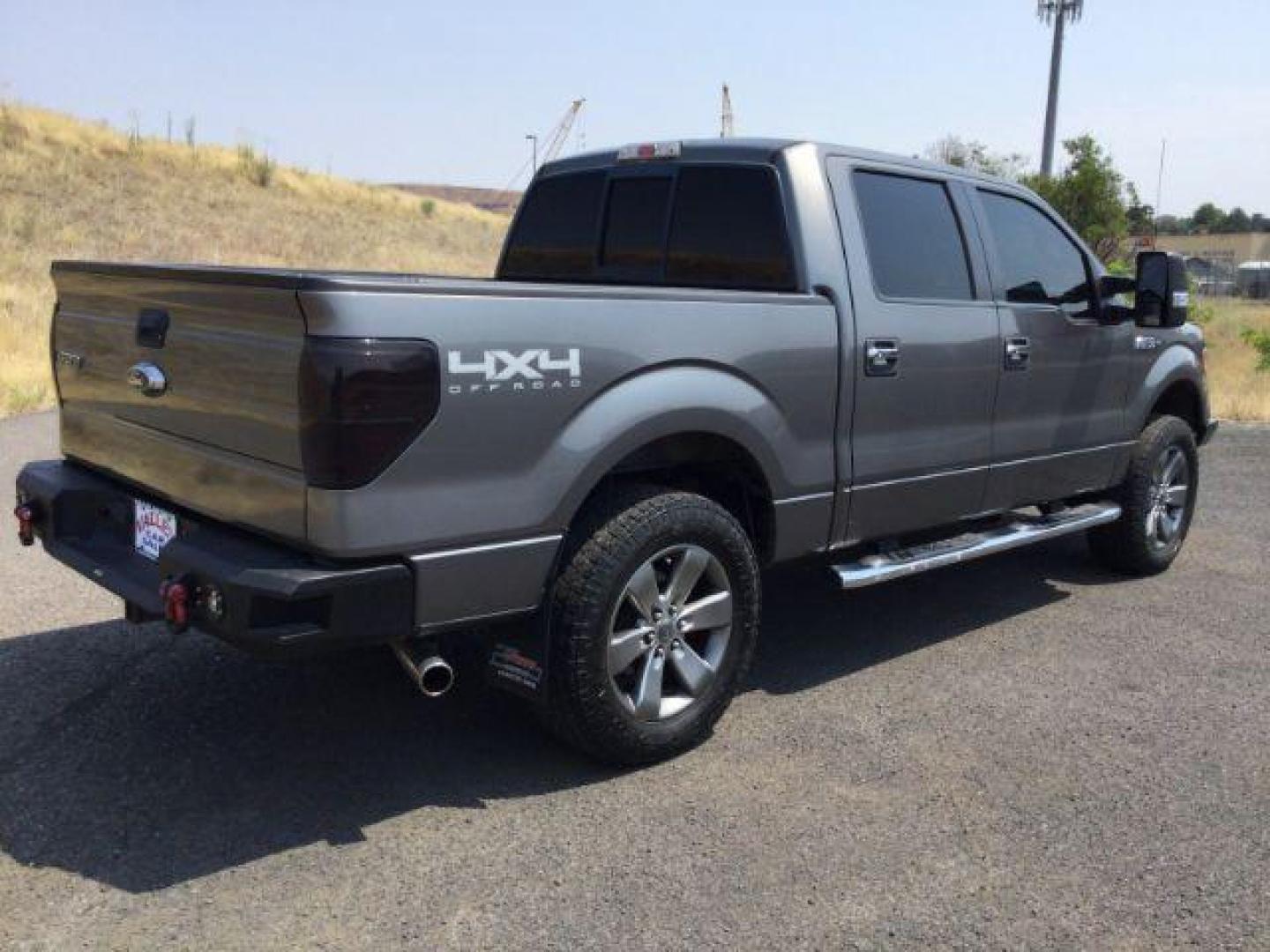 2012 Sterling Gray Metallic /Steel Gray Cloth Interior Ford F-150 XLT SuperCrew 5.5-ft. Bed 4WD (1FTFW1EF8CF) with an 5.0L V8 engine, 6-Speed Automatic transmission, located at 1801 Main Street, Lewiston, 83501, (208) 743-9371, 46.417065, -117.004799 - Photo#11