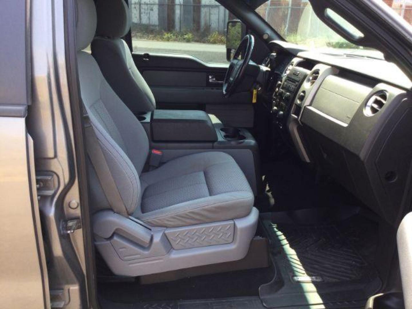 2012 Sterling Gray Metallic /Steel Gray Cloth Interior Ford F-150 XLT SuperCrew 5.5-ft. Bed 4WD (1FTFW1EF8CF) with an 5.0L V8 engine, 6-Speed Automatic transmission, located at 1801 Main Street, Lewiston, 83501, (208) 743-9371, 46.417065, -117.004799 - Photo#17