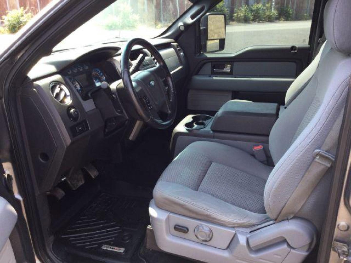 2012 Sterling Gray Metallic /Steel Gray Cloth Interior Ford F-150 XLT SuperCrew 5.5-ft. Bed 4WD (1FTFW1EF8CF) with an 5.0L V8 engine, 6-Speed Automatic transmission, located at 1801 Main Street, Lewiston, 83501, (208) 743-9371, 46.417065, -117.004799 - Photo#3