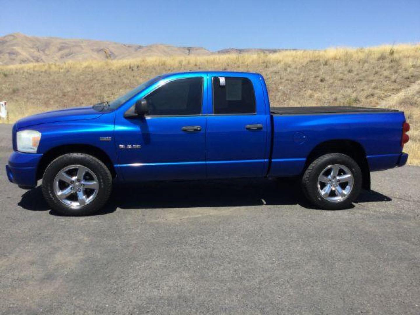 2008 Electric Blue Pearl /Medium Slate Gray Cloth Interior Dodge Ram 1500 SLT Quad Cab 4WD (1D7HU18228J) with an 5.7L V8 OHV 16V engine, 5-Speed Automatic transmission, located at 1801 Main Street, Lewiston, 83501, (208) 743-9371, 46.417065, -117.004799 - Photo#1