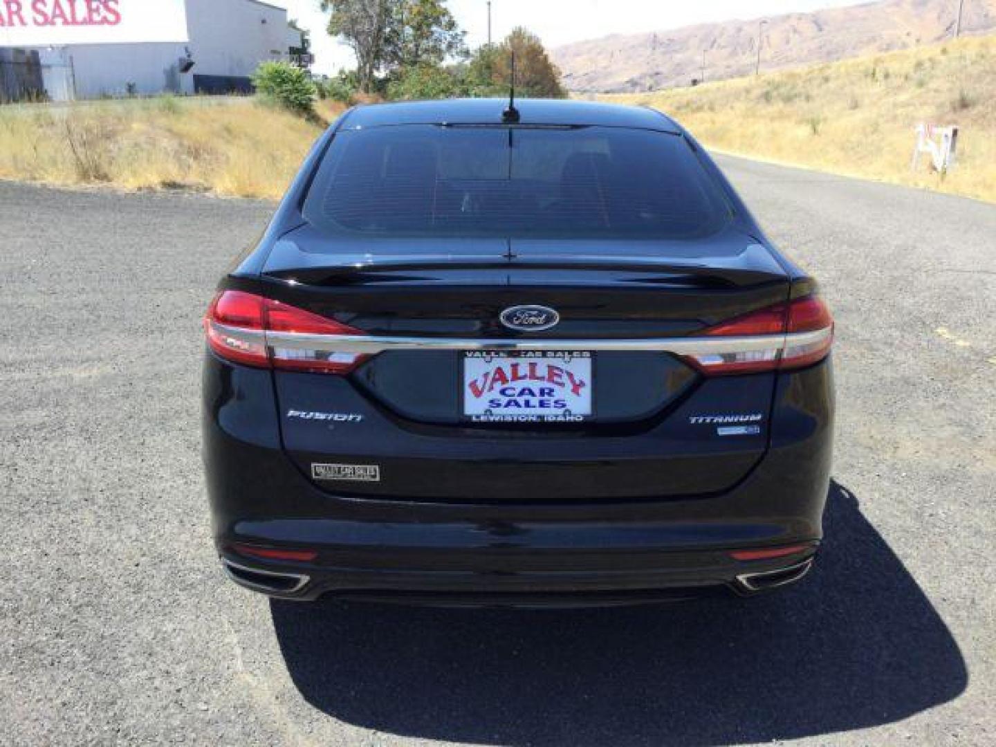 2017 Shadow Black /Ebony, premium leather Ford Fusion Titanium AWD (3FA6P0D94HR) with an 2.0L L4 DOHC 16V engine, 6-Speed Automatic transmission, located at 1801 Main Street, Lewiston, 83501, (208) 743-9371, 46.417065, -117.004799 - Photo#9