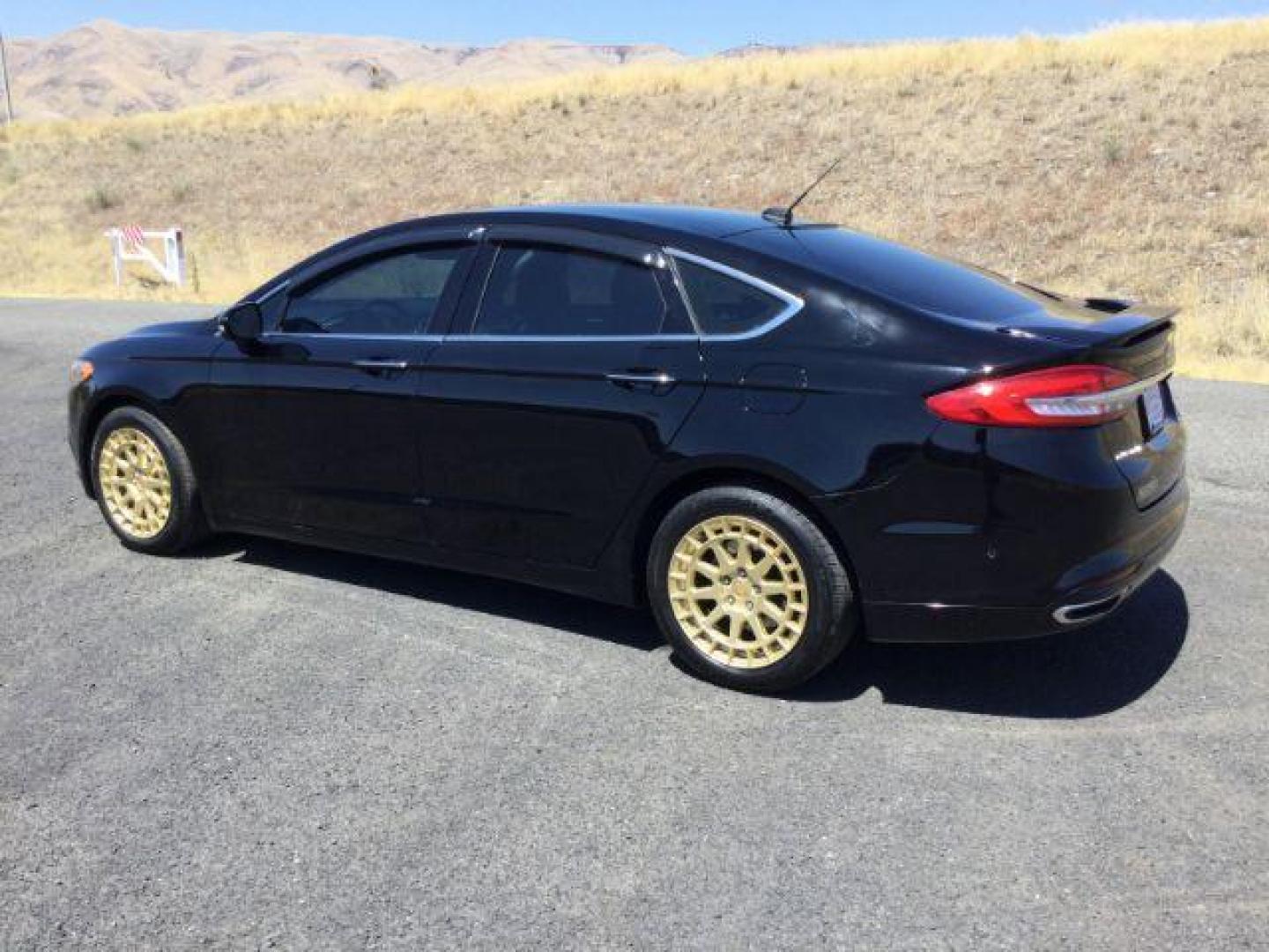 2017 Shadow Black /Ebony, premium leather Ford Fusion Titanium AWD (3FA6P0D94HR) with an 2.0L L4 DOHC 16V engine, 6-Speed Automatic transmission, located at 1801 Main Street, Lewiston, 83501, (208) 743-9371, 46.417065, -117.004799 - Photo#2