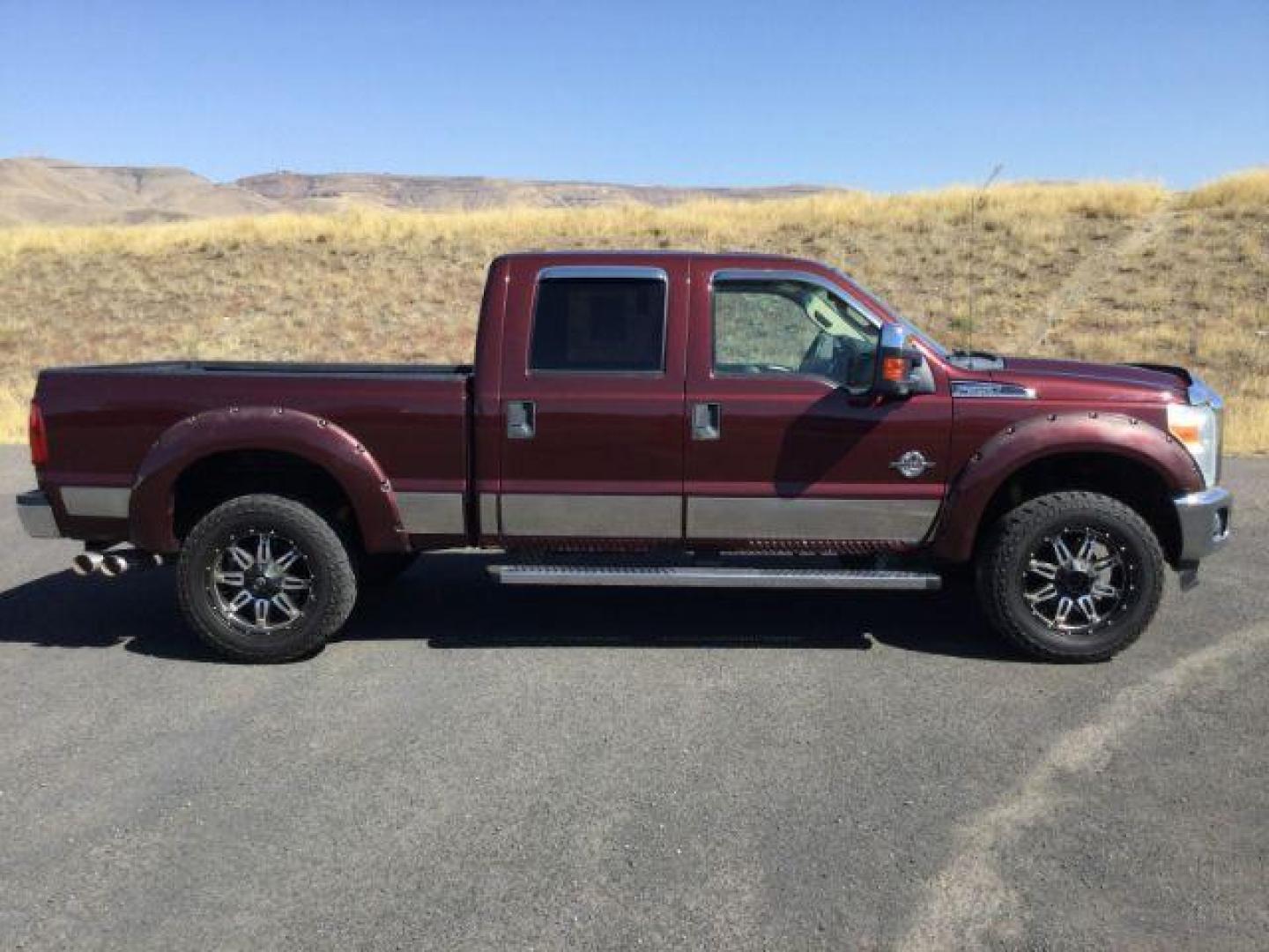 2011 Royal Red Metallic /Adobe Cloth Interior Ford F-350 SD XLT Crew Cab 4WD (1FT8W3BT8BE) with an 6.7L V8 OHV 16V DIESEL engine, 6-Speed Automatic transmission, located at 1801 Main Street, Lewiston, 83501, (208) 743-9371, 46.417065, -117.004799 - Photo#9