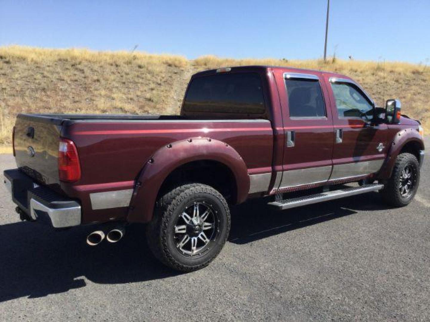 2011 Royal Red Metallic /Adobe Cloth Interior Ford F-350 SD XLT Crew Cab 4WD (1FT8W3BT8BE) with an 6.7L V8 OHV 16V DIESEL engine, 6-Speed Automatic transmission, located at 1801 Main Street, Lewiston, 83501, (208) 743-9371, 46.417065, -117.004799 - Photo#10